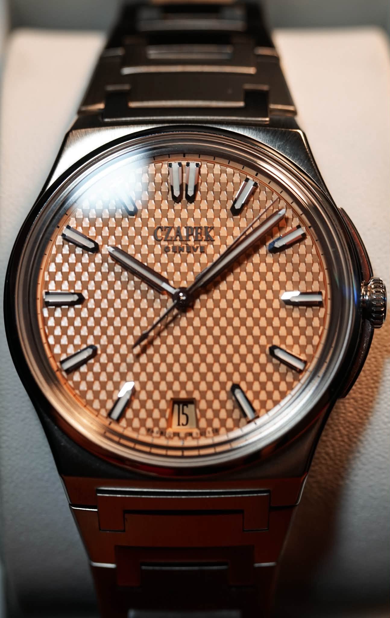 May be an image of wrist watch and text
