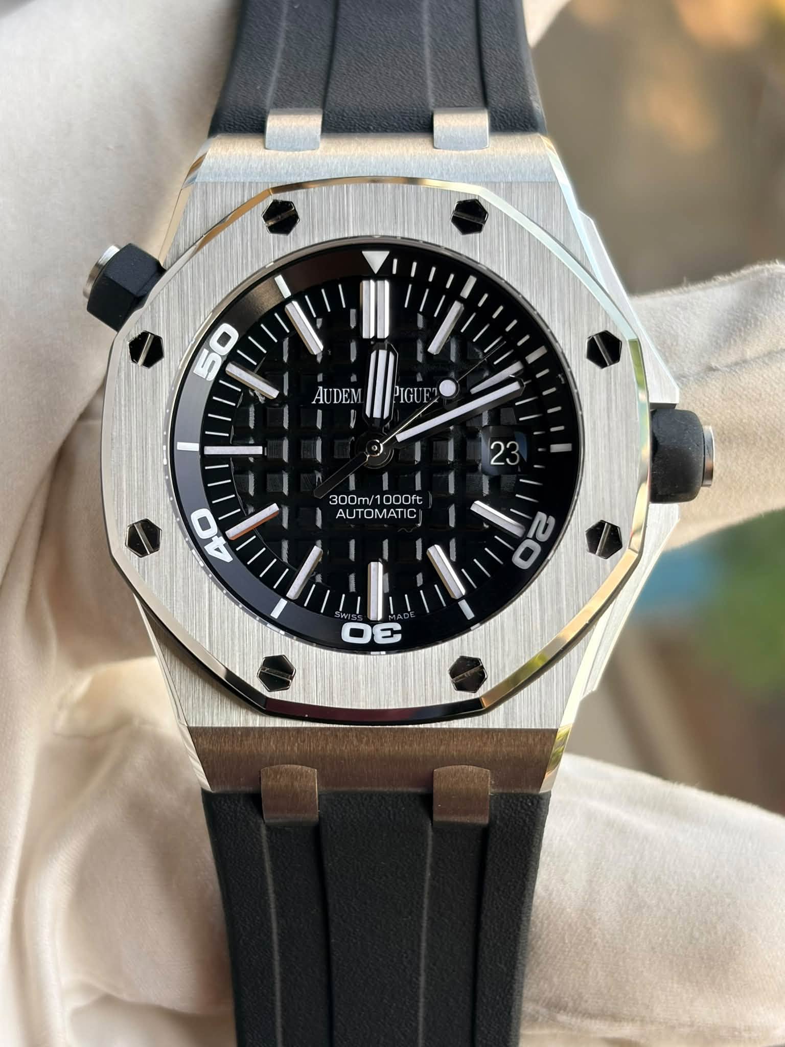 May be an image of wrist watch and text