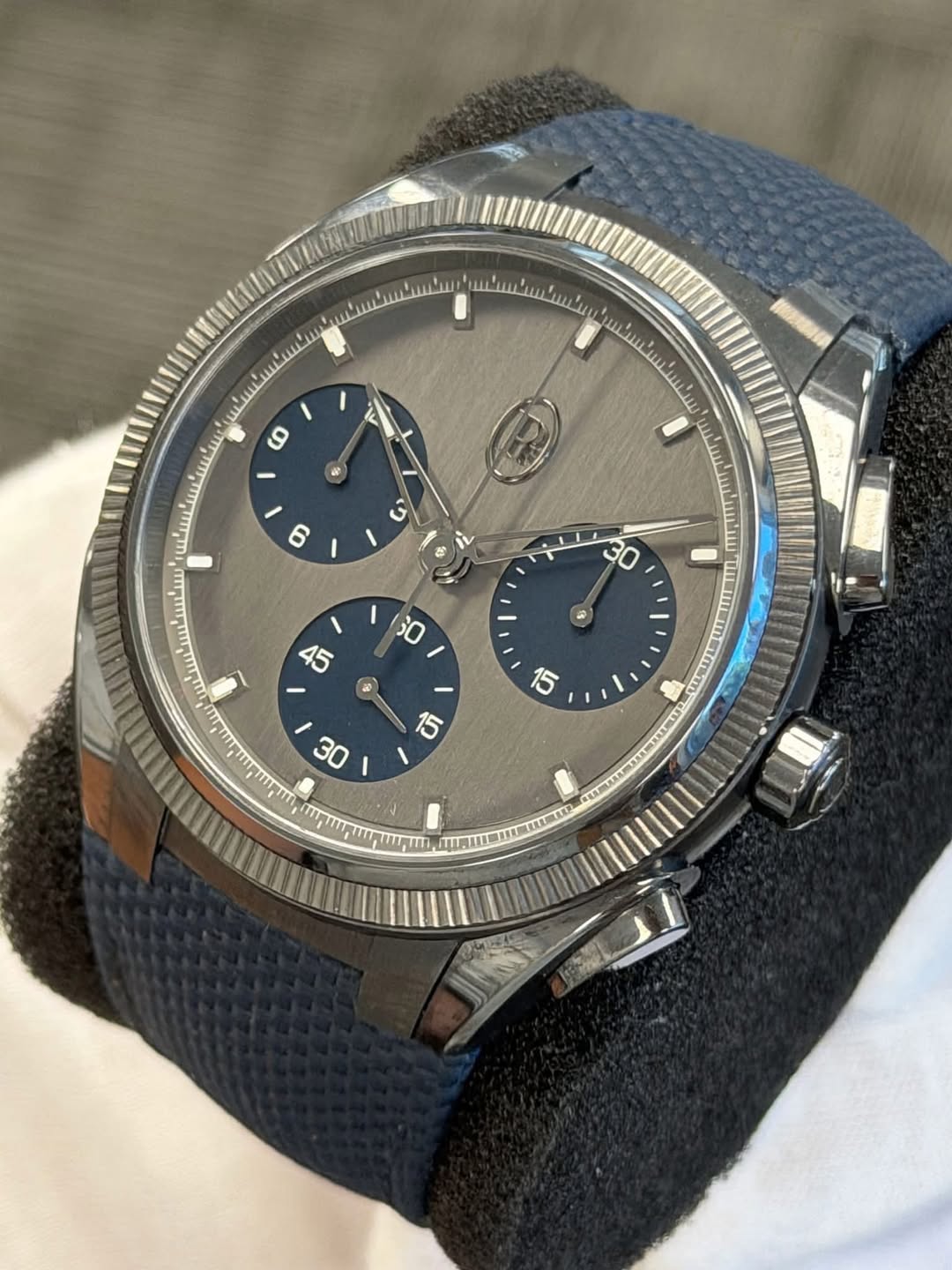 May be an image of wrist watch and text