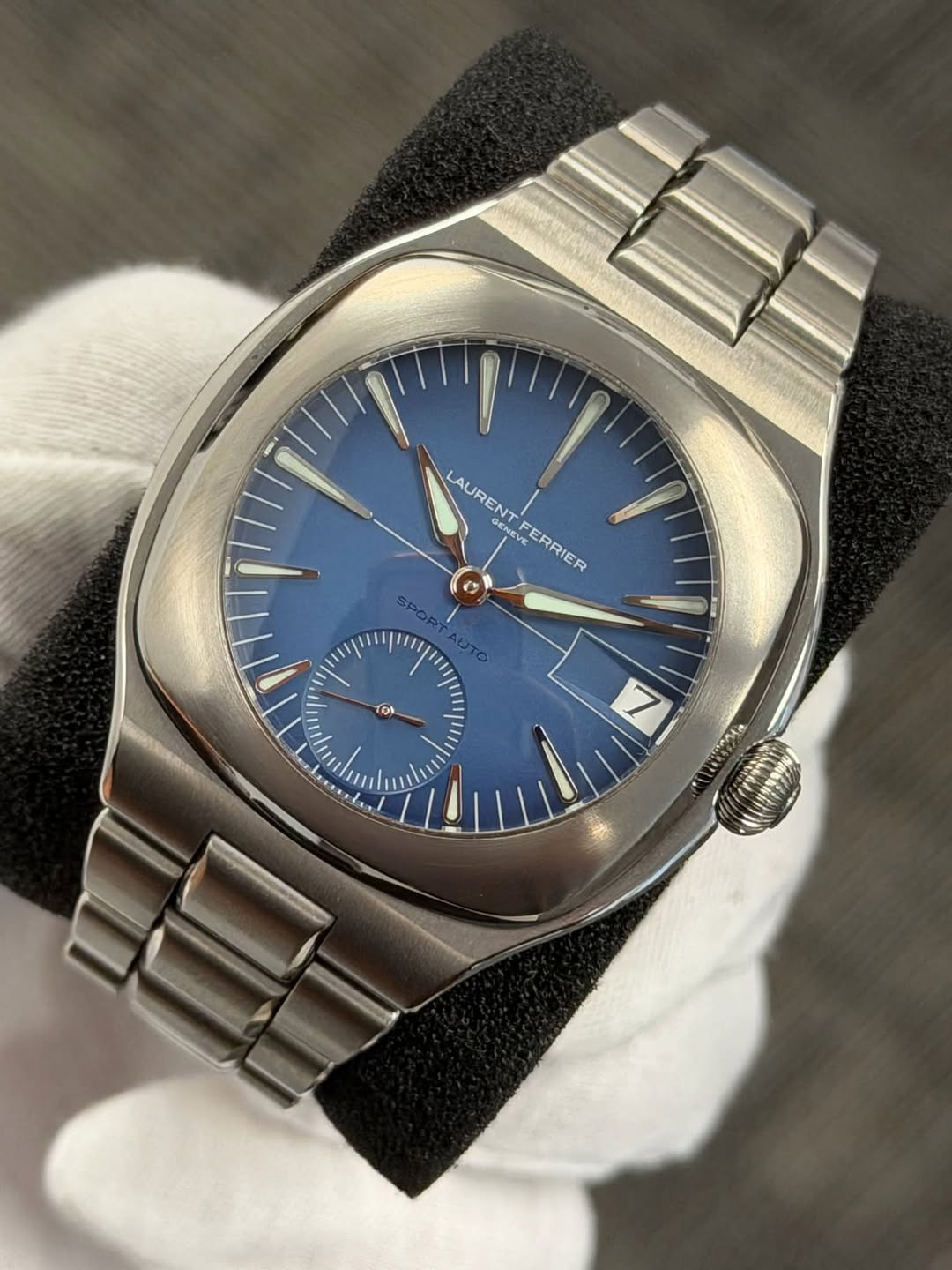May be an image of wrist watch and text