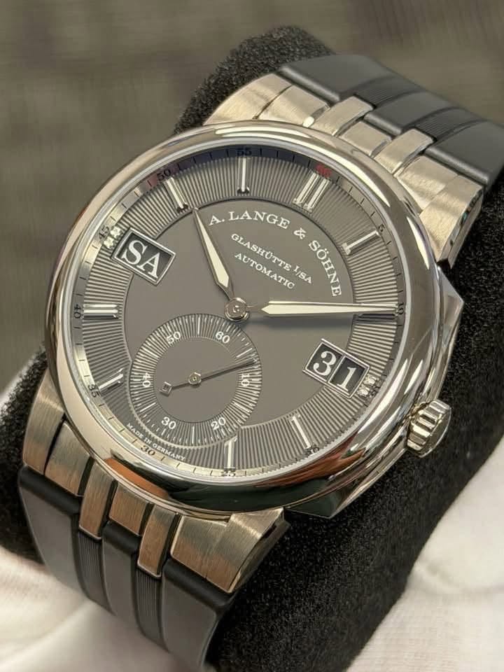May be an image of wrist watch and text