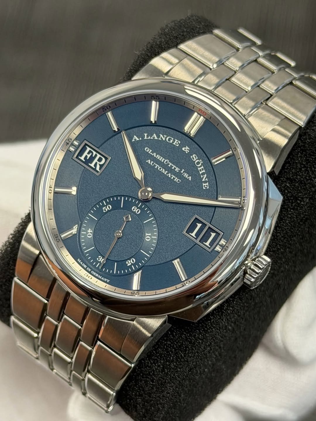 May be an image of wrist watch and text