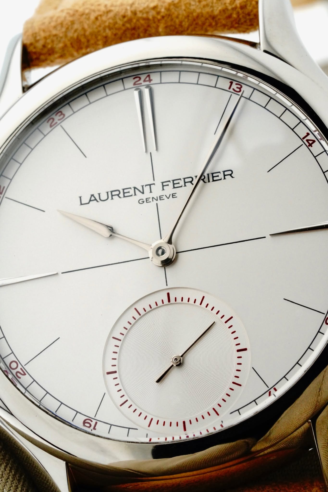 May be an image of wrist watch and text