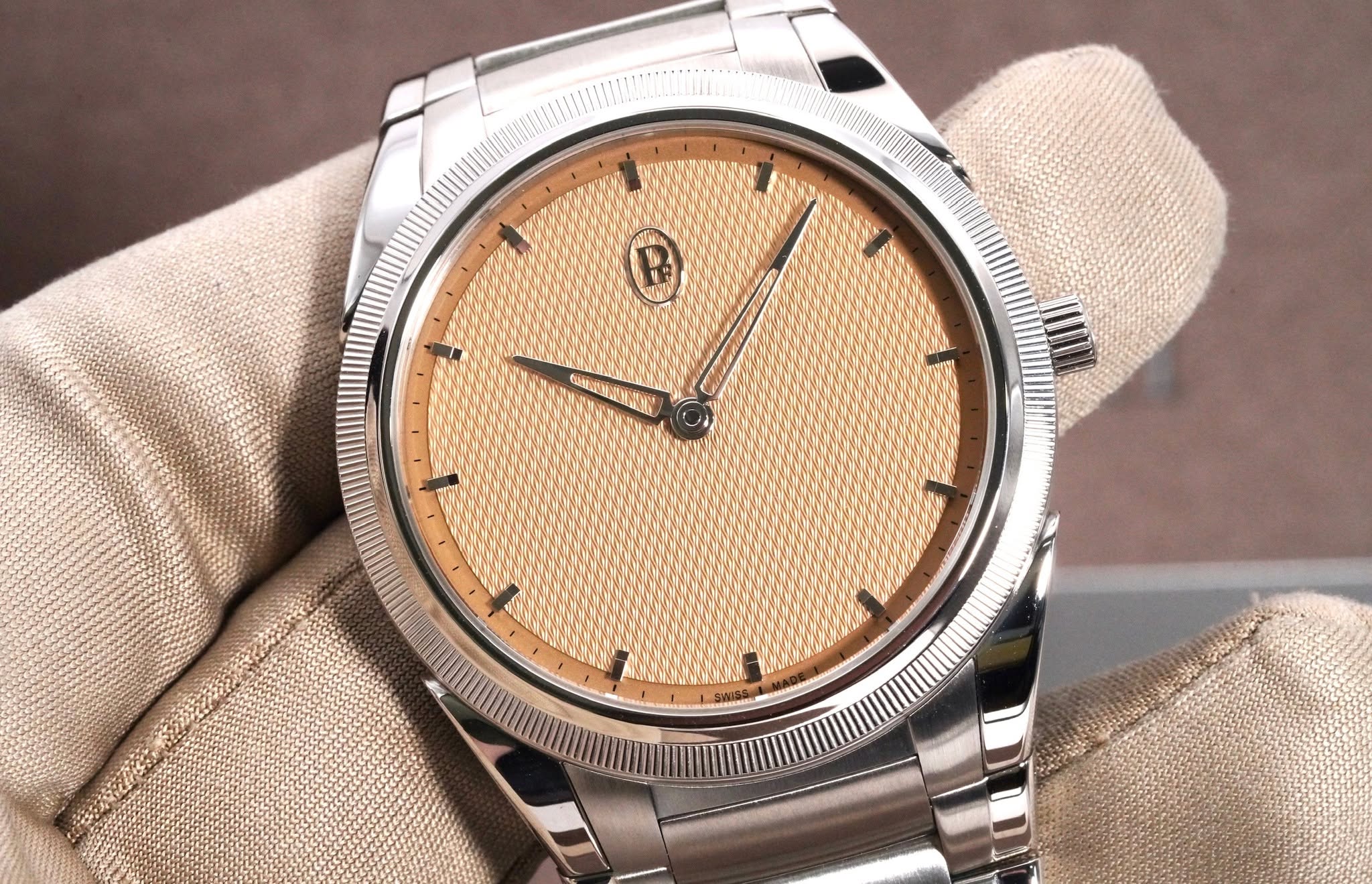 May be an image of wrist watch and text