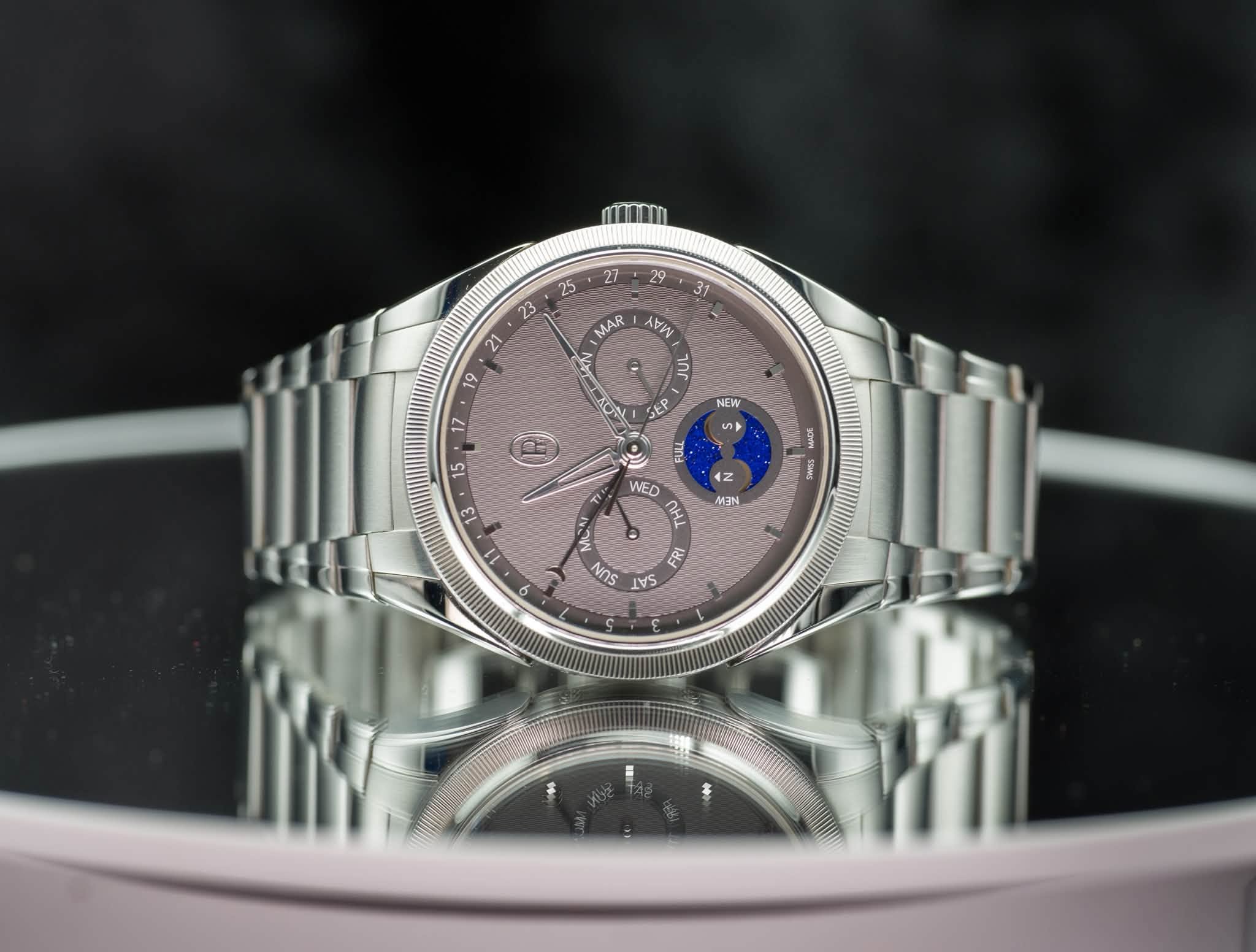 May be an image of wrist watch and text