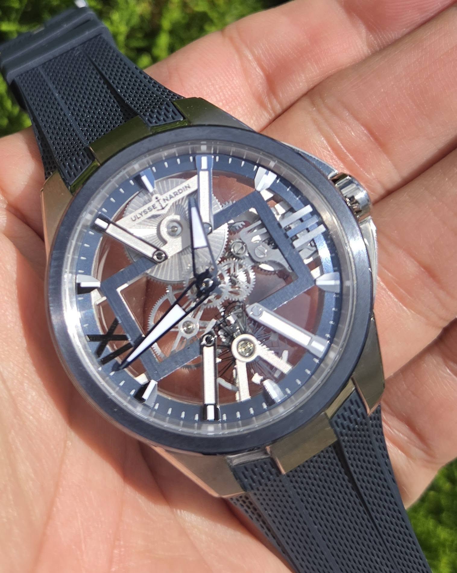 May be an image of wrist watch and text