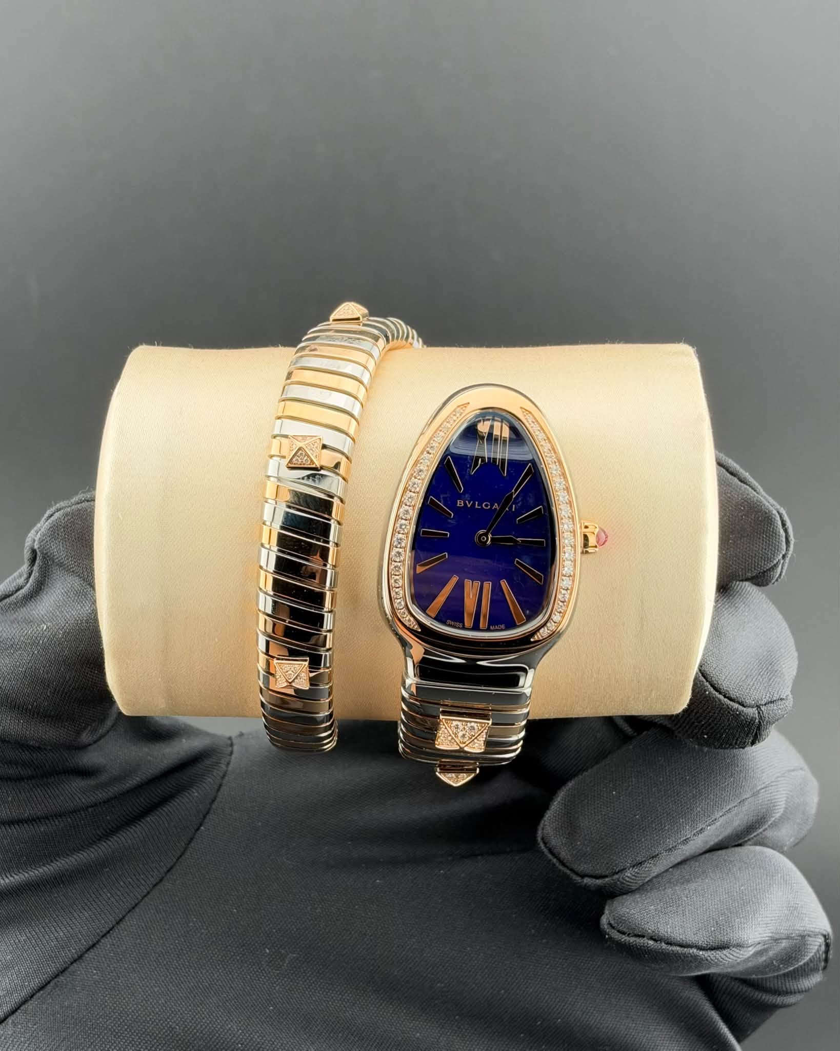 May be an image of wrist watch and jewelry