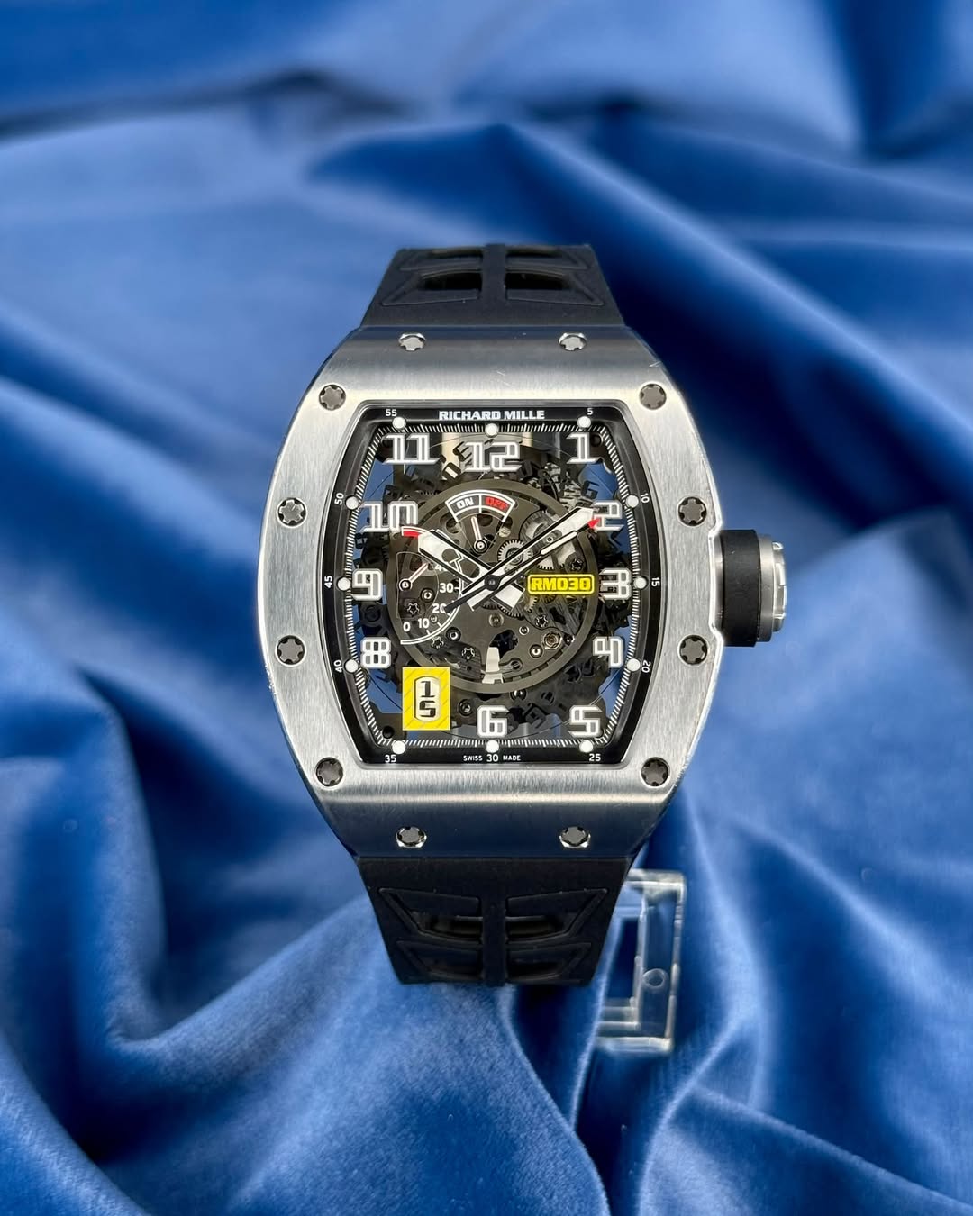 May be an image of wrist watch and text