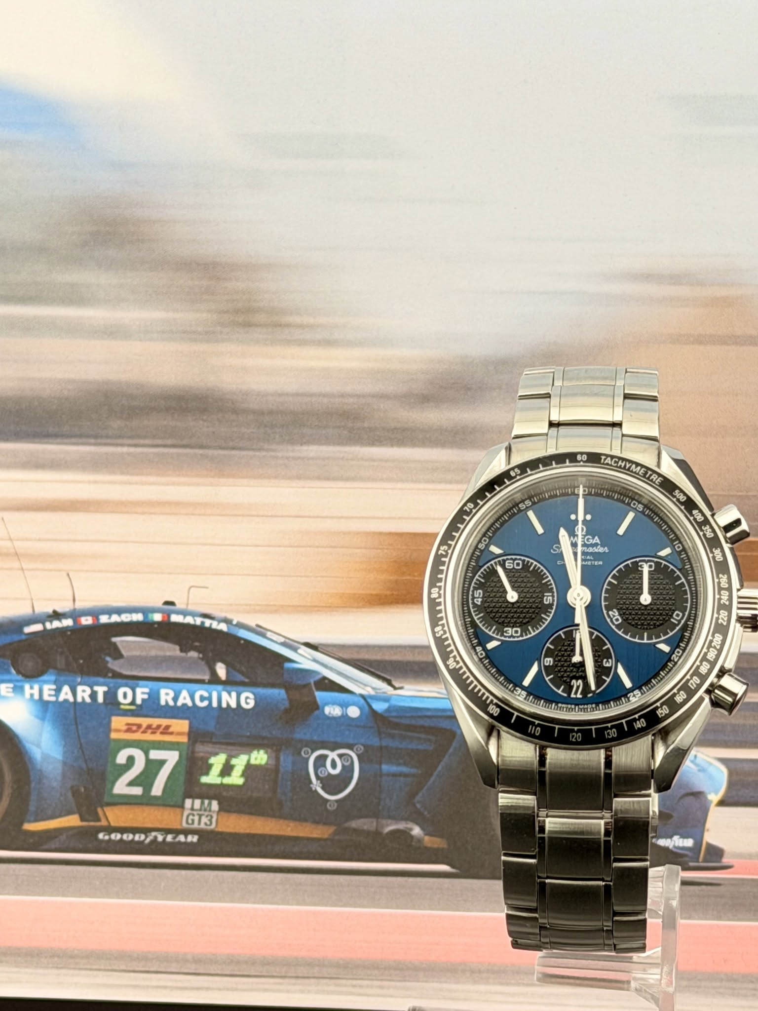 May be an image of wrist watch and text that says '65 OS 60 TACHYME RE s00 400 i t0 0 жAcH S teA EGR o6e m MASTER 60 BATT 5 3P I HEART OF RACING 20 เ 30 O0 1 300 260O 0ZZ 00006 0 ៣…