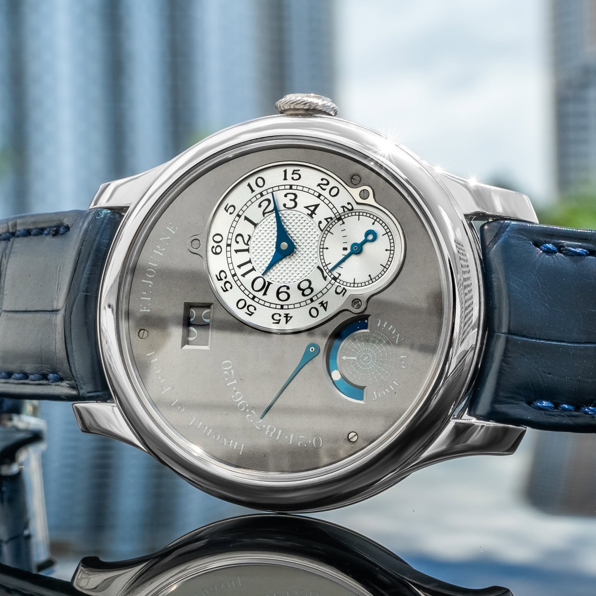 May be an image of wrist watch and text