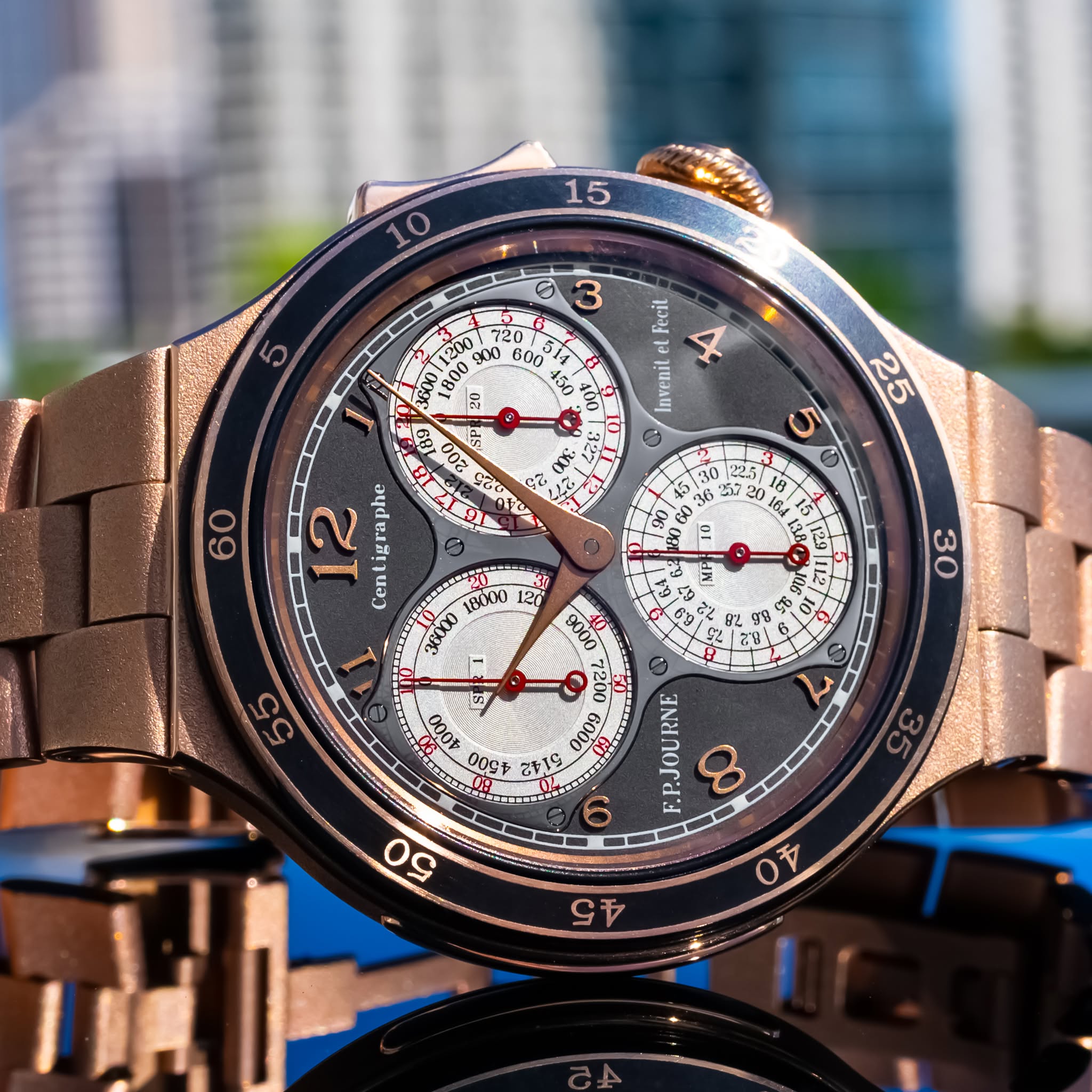 May be an image of wrist watch and text