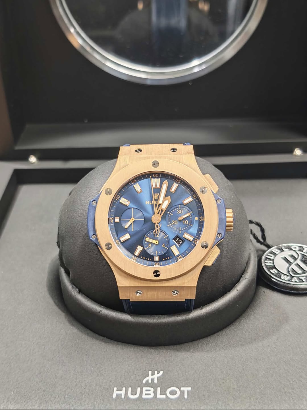 May be an image of wrist watch and text