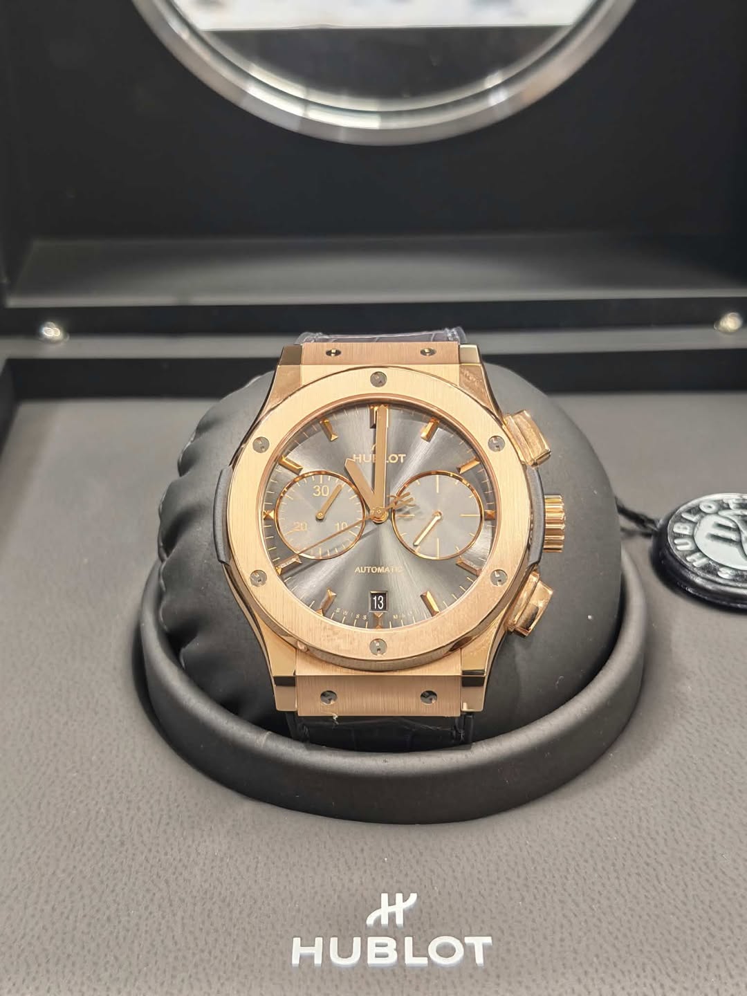 May be an image of wrist watch and text