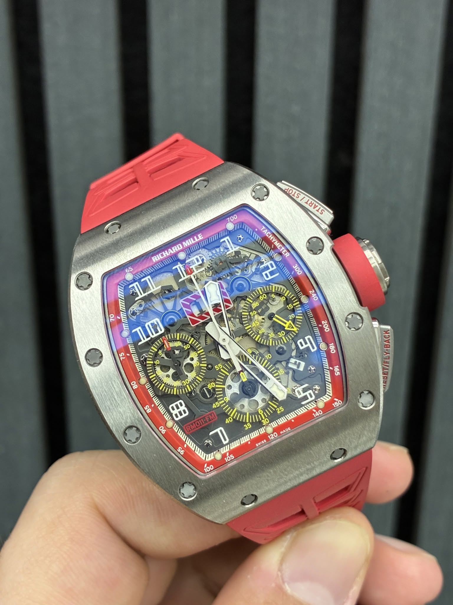 May be an image of wrist watch and text