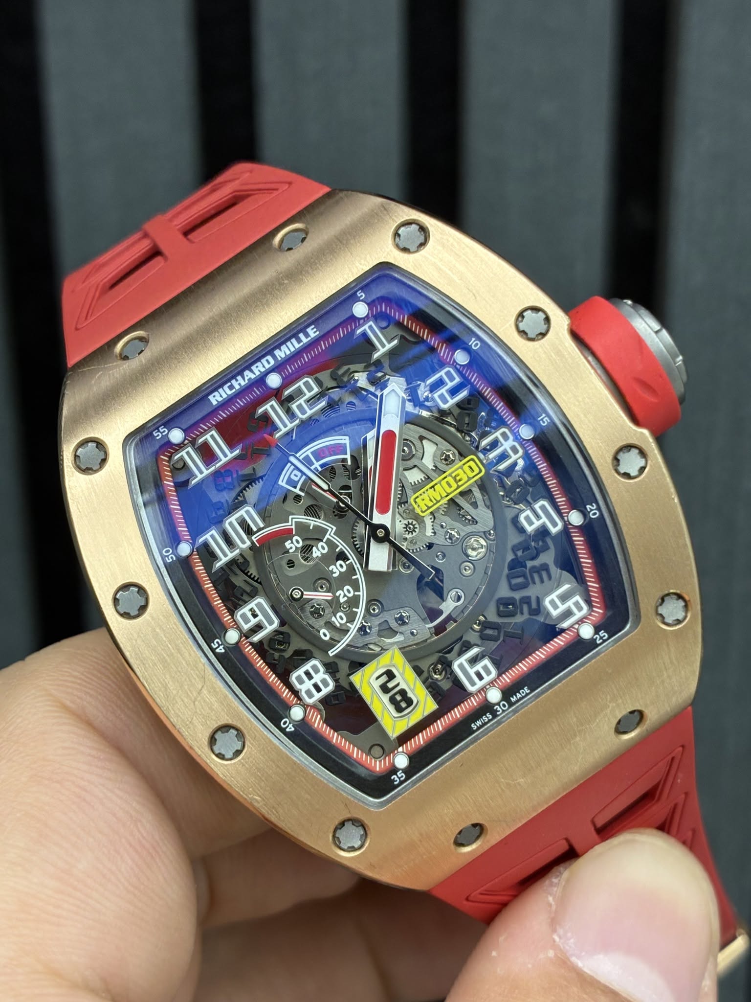May be an image of wrist watch and text
