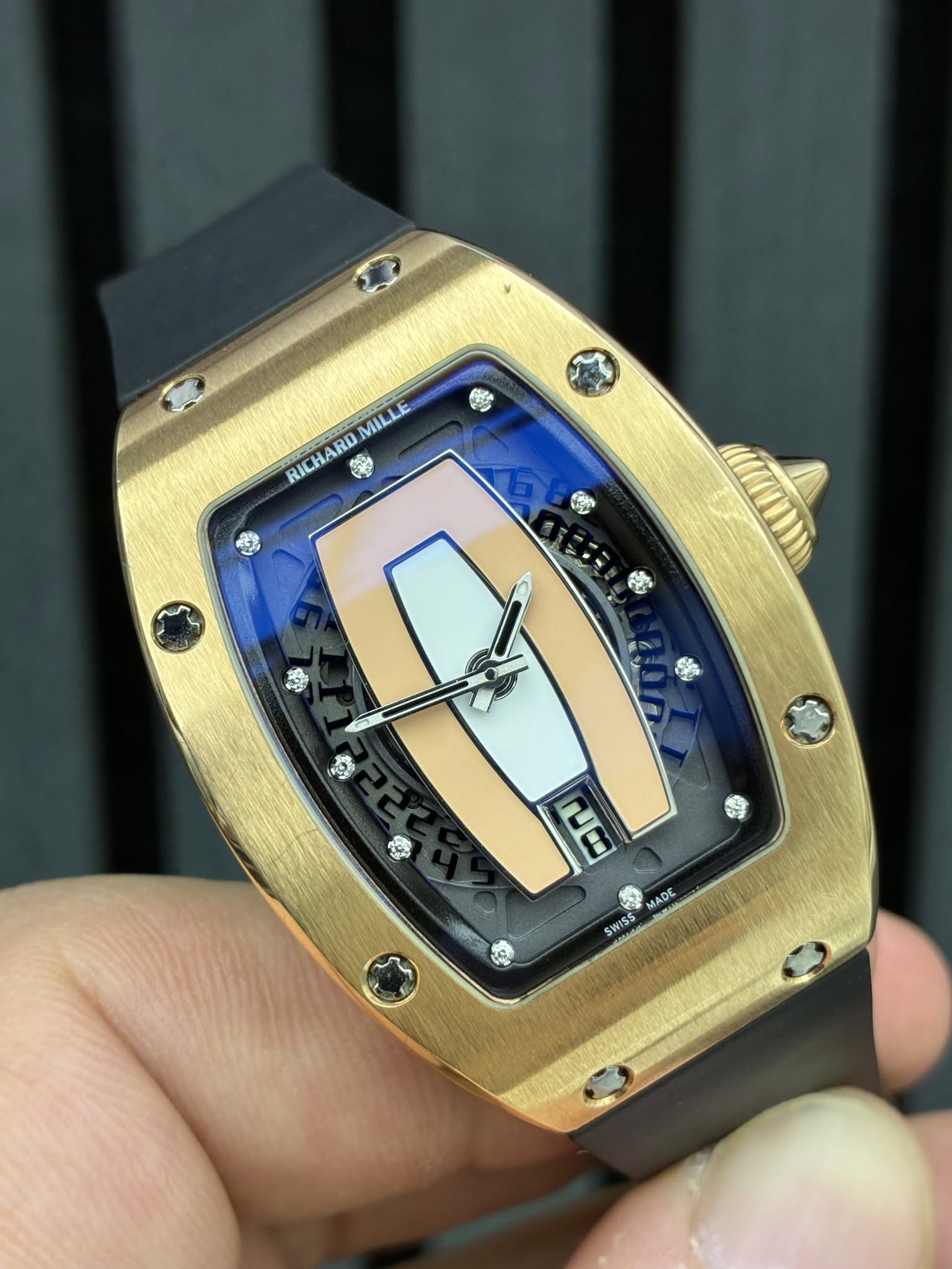 May be an image of wrist watch and text