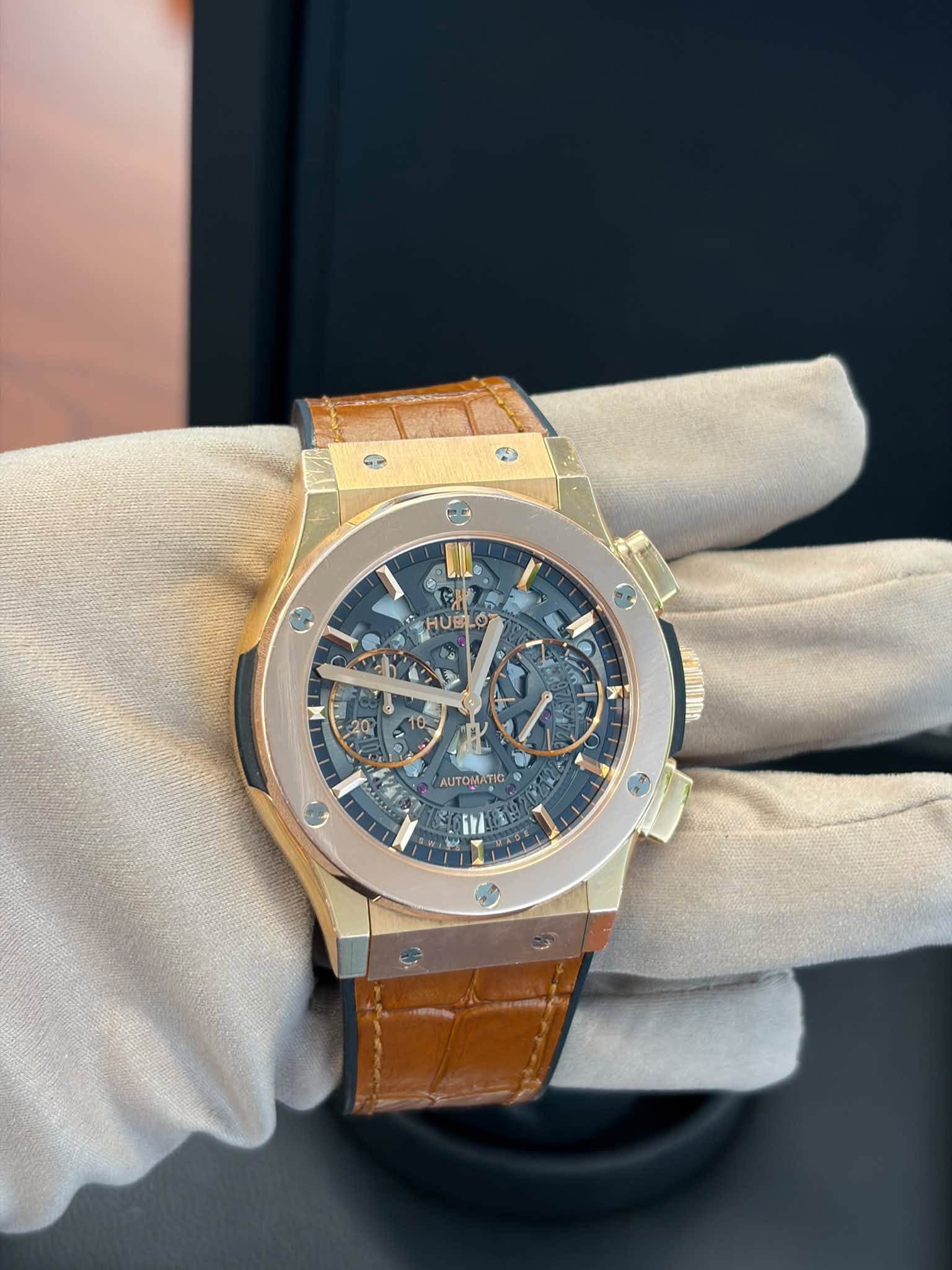 May be an image of wrist watch and text