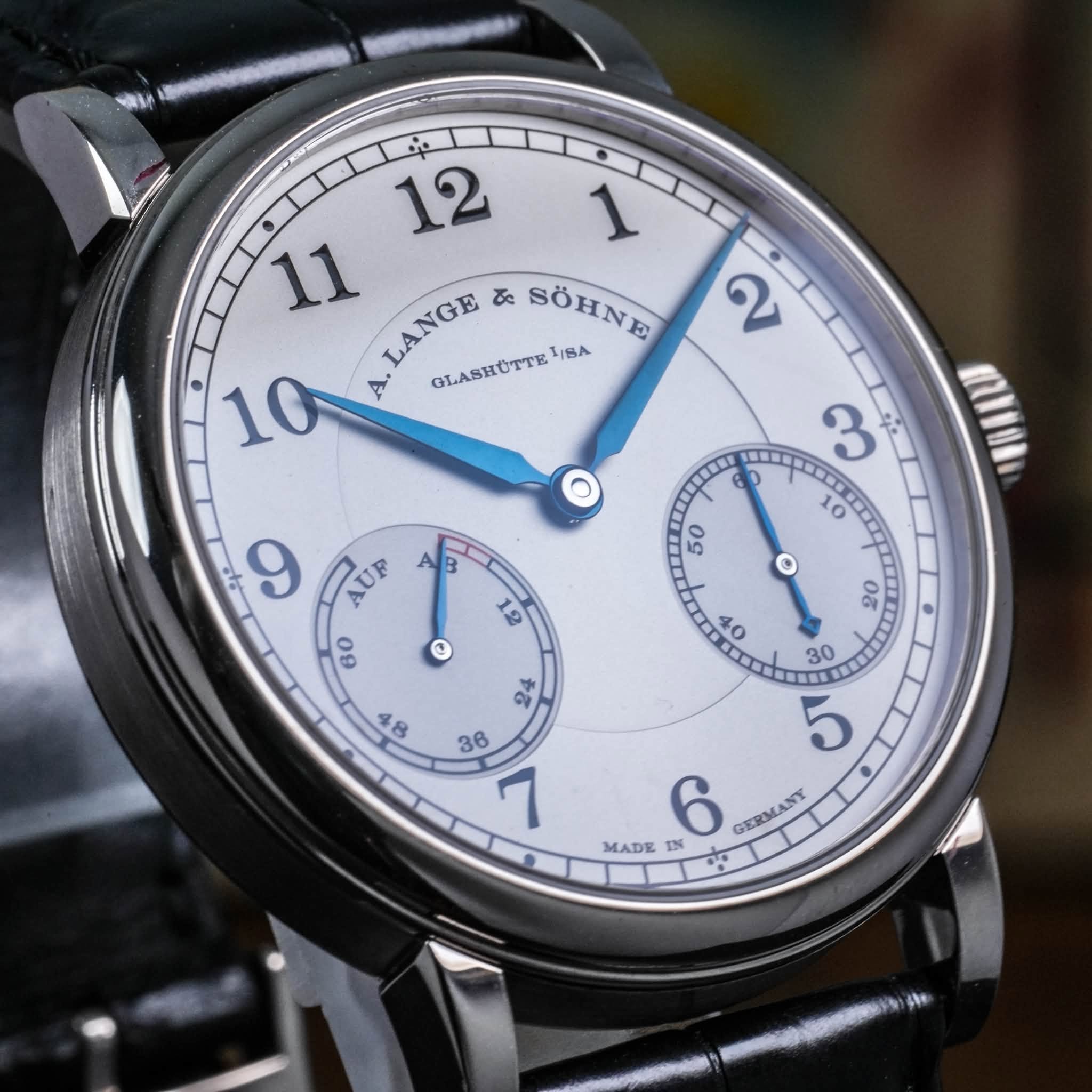 May be an image of wrist watch and text