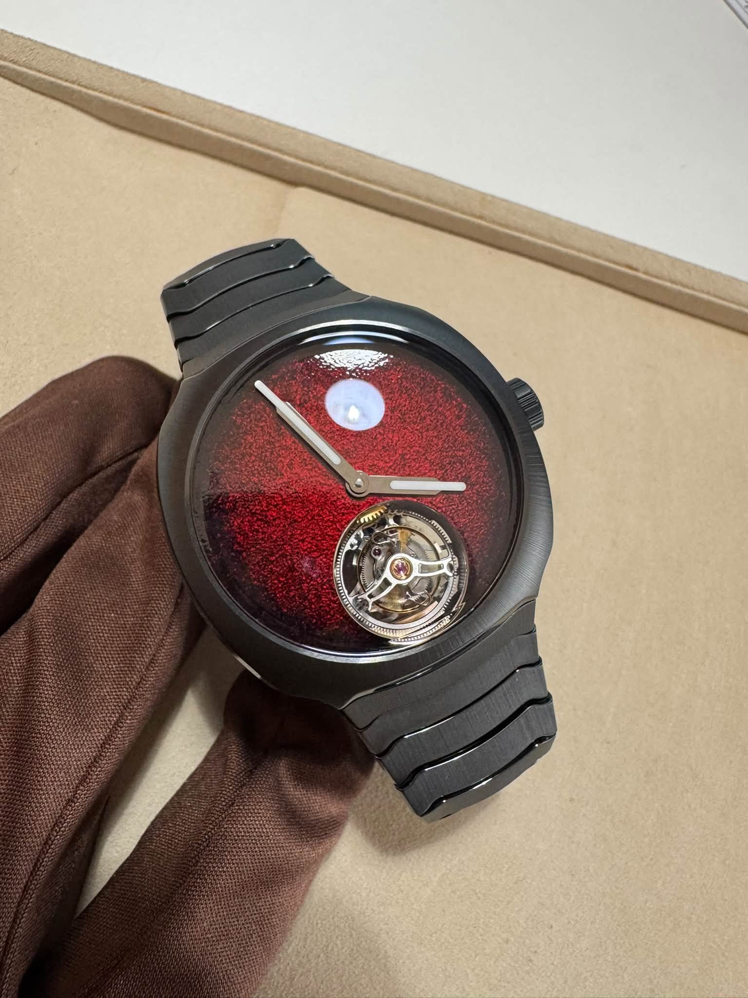 May be an image of wrist watch and text