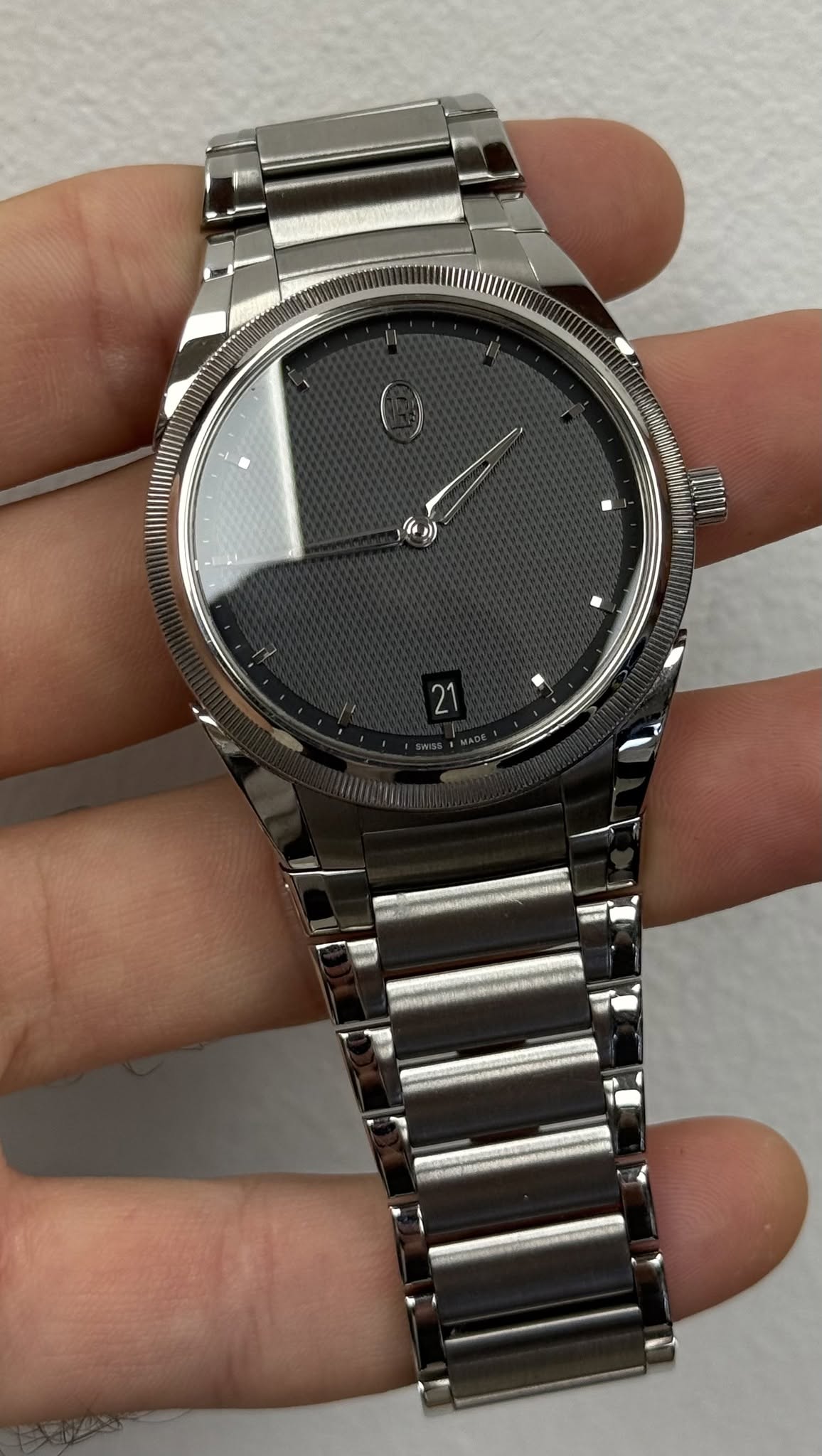 May be an image of wrist watch