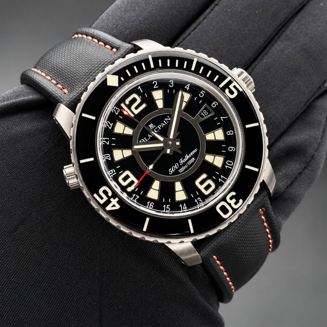 May be an image of wrist watch and text