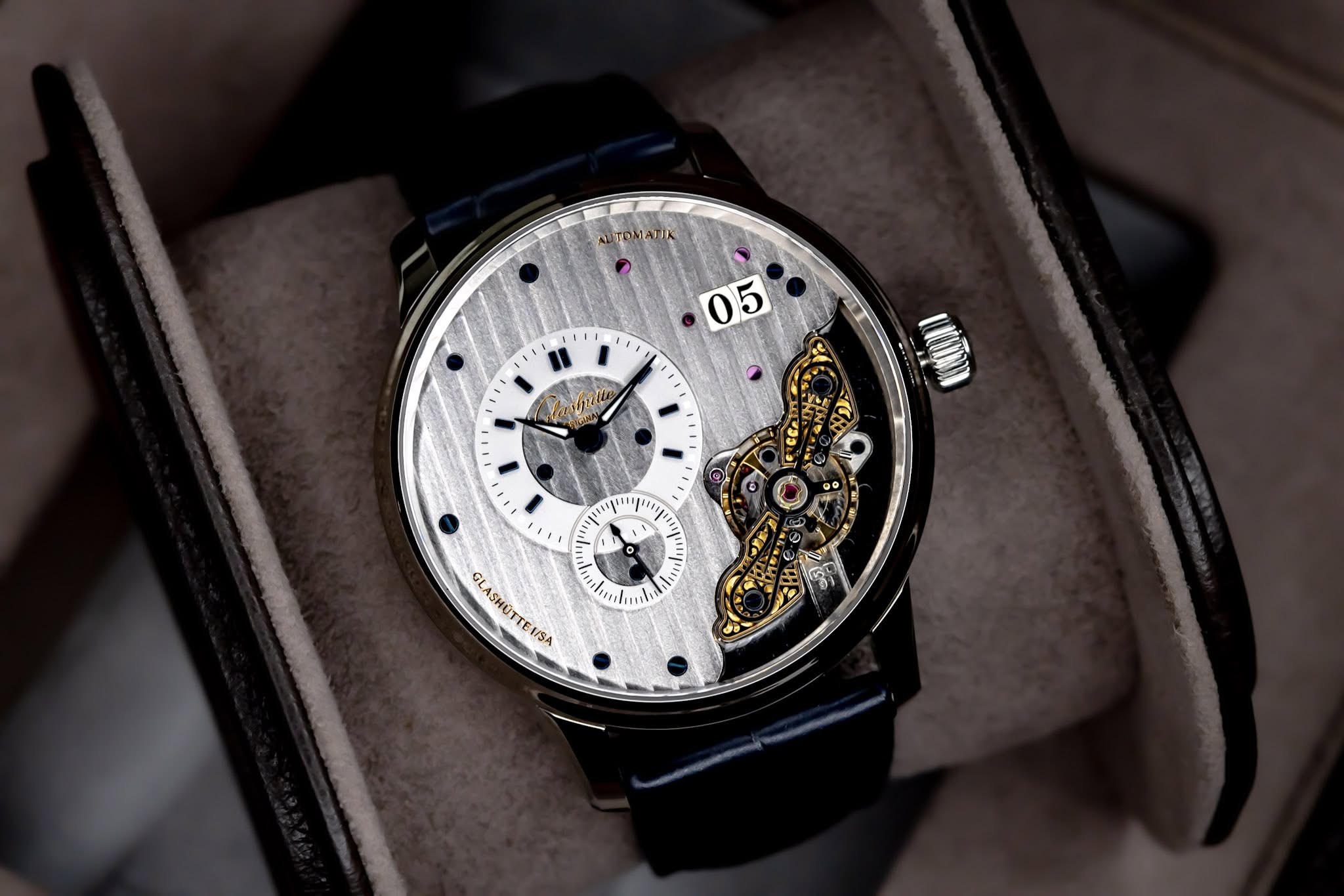 May be an image of wrist watch and text