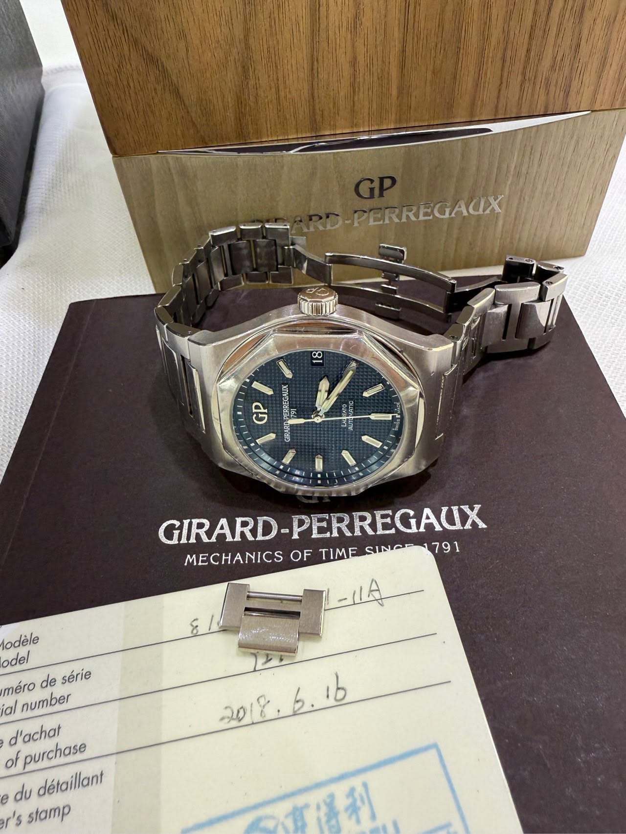 May be an image of wrist watch and text that says 'SARD-PERREGALX RD-PERREGAUX 6 ាា GP CEREGALIK SAA 도 GIRARD-PERREGAUX SINGE 791 GIRARD -PERREGAUX MECHANICSOFTIM MECHANICS OF TIME…