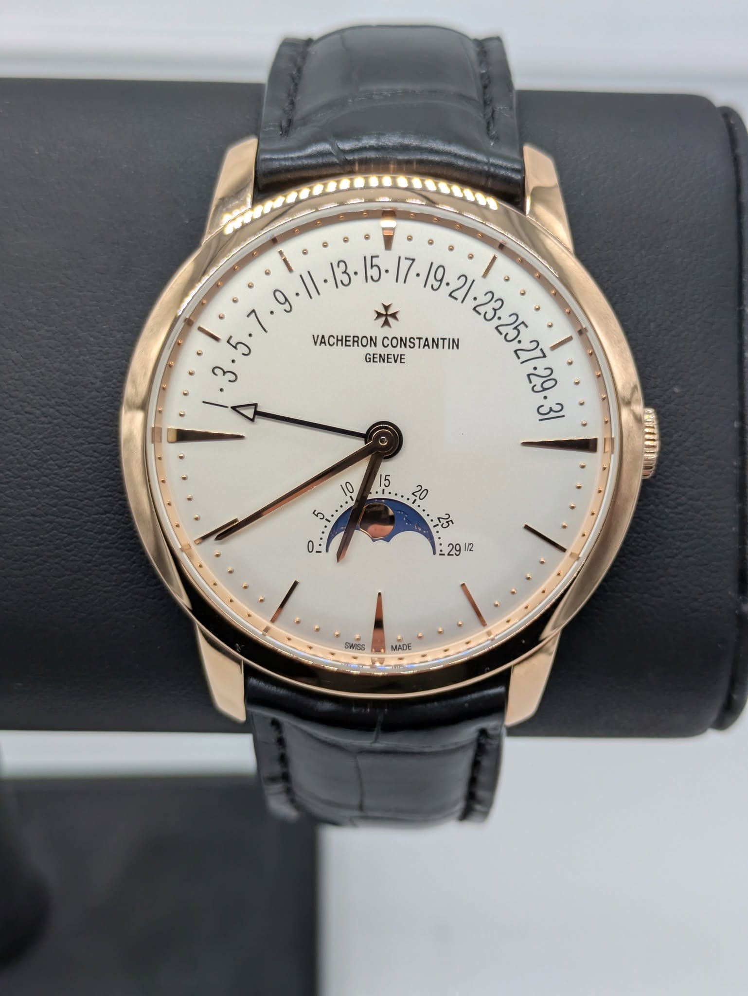 May be an image of wrist watch and text