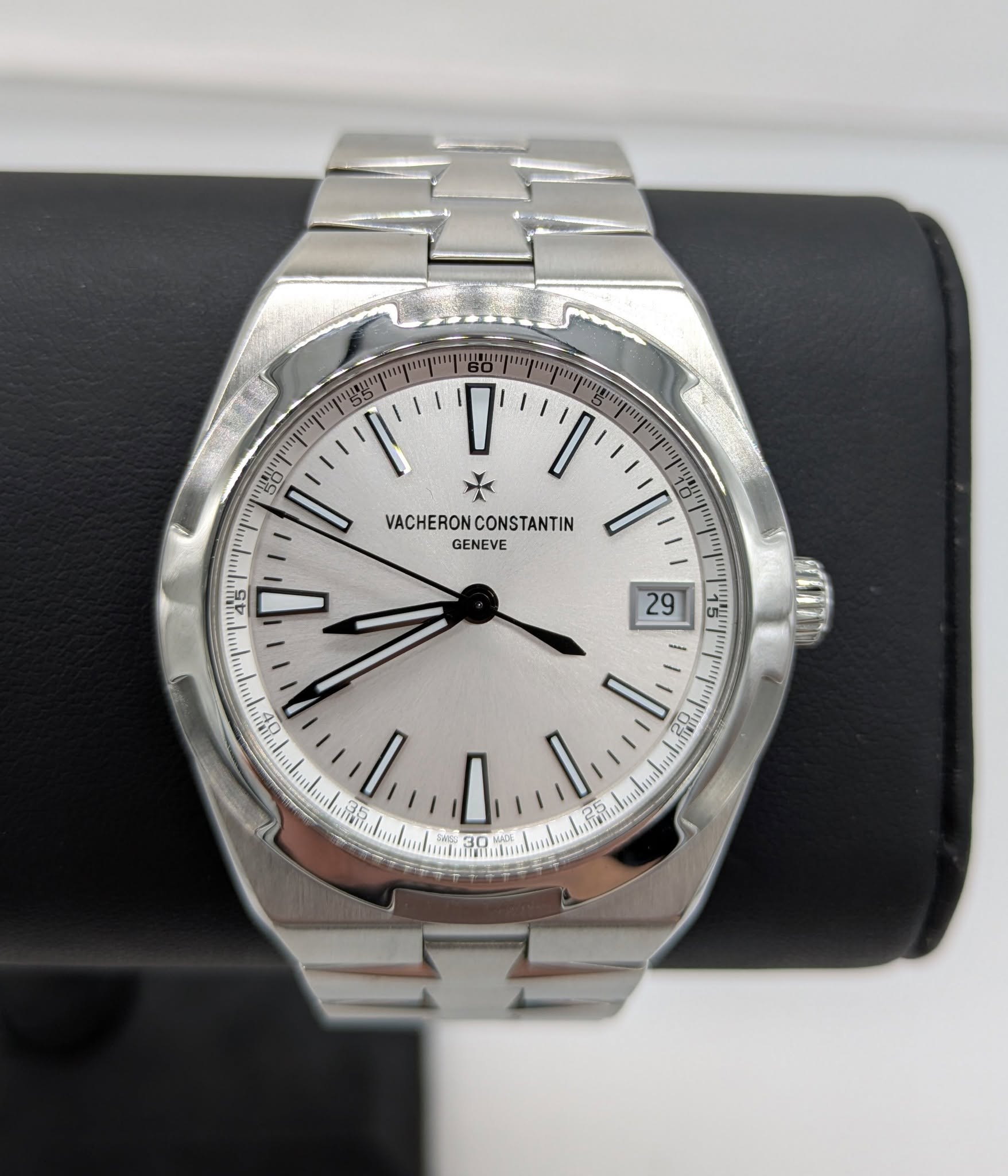 May be an image of wrist watch and text