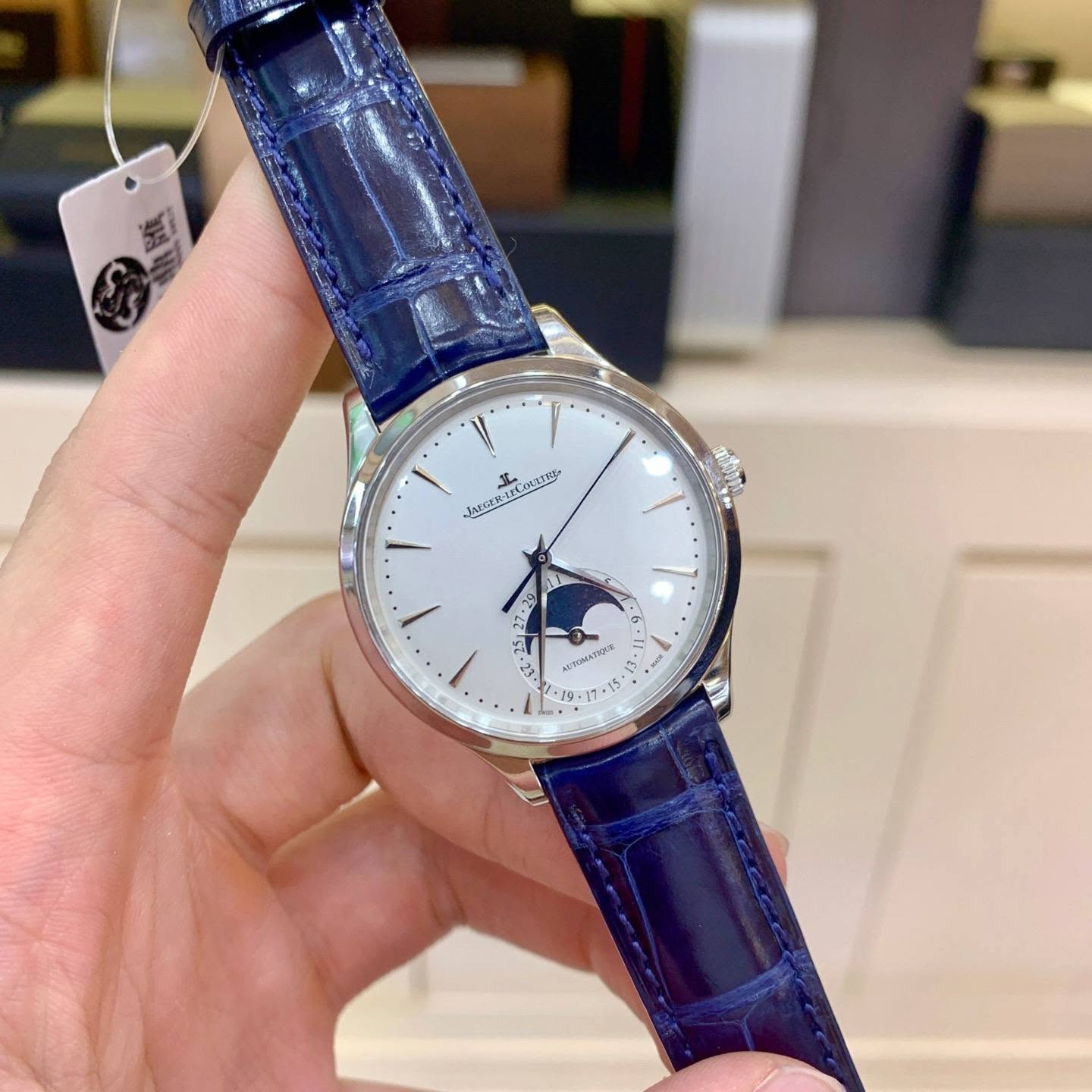 May be an image of wrist watch and text