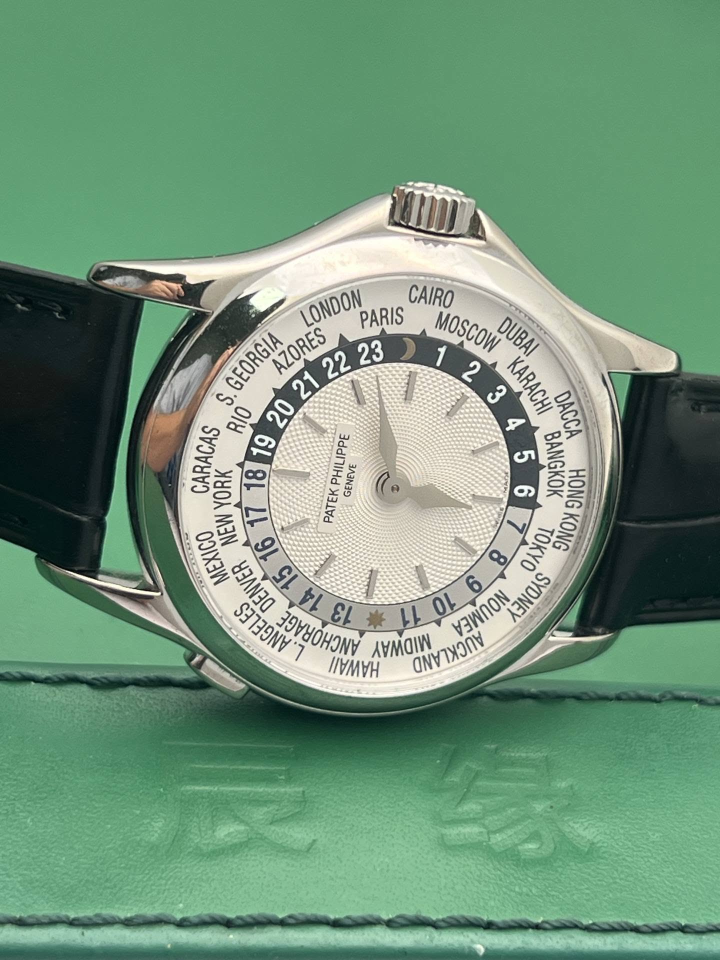 May be an image of wrist watch and text