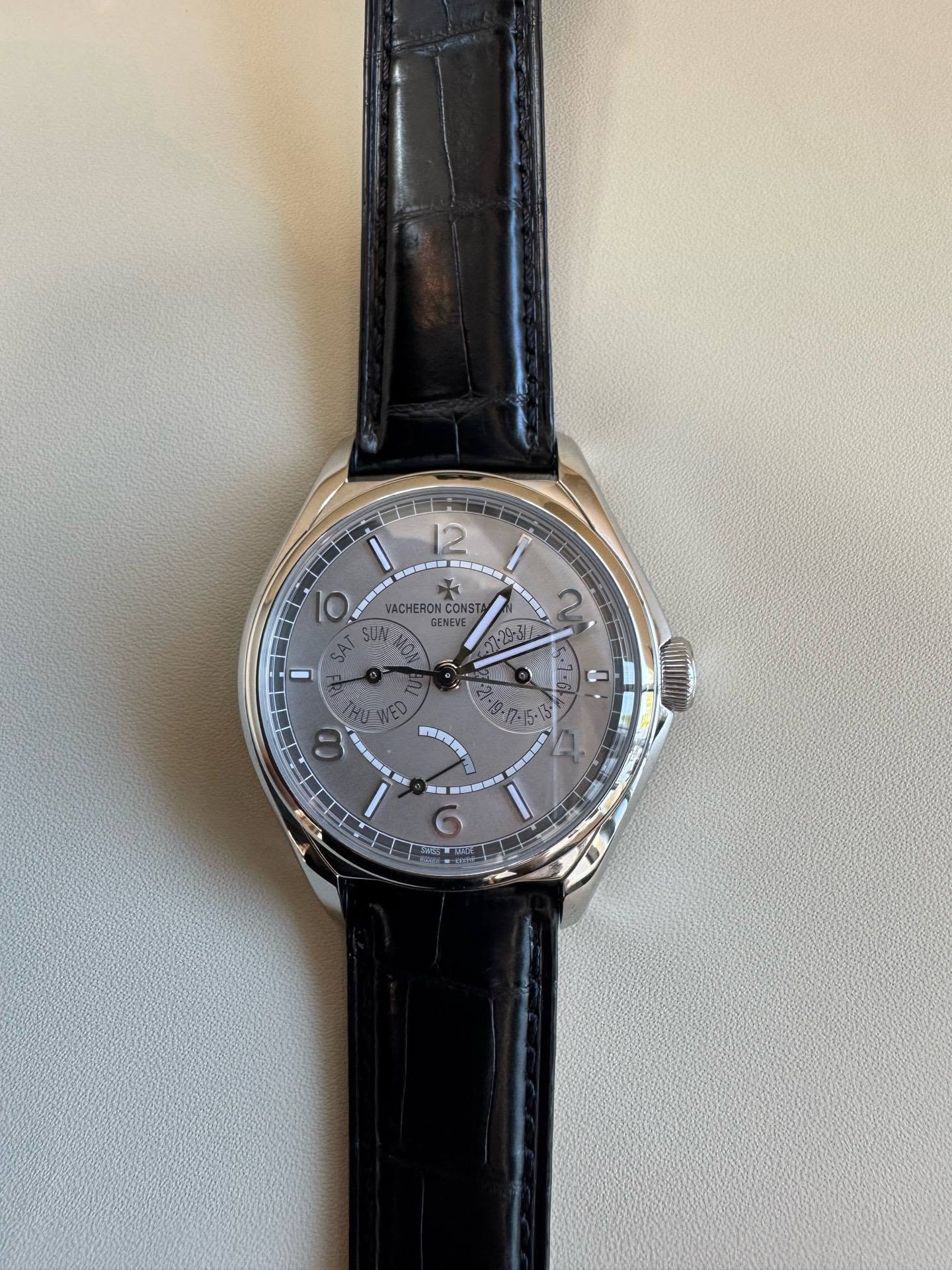 May be an image of wrist watch and text