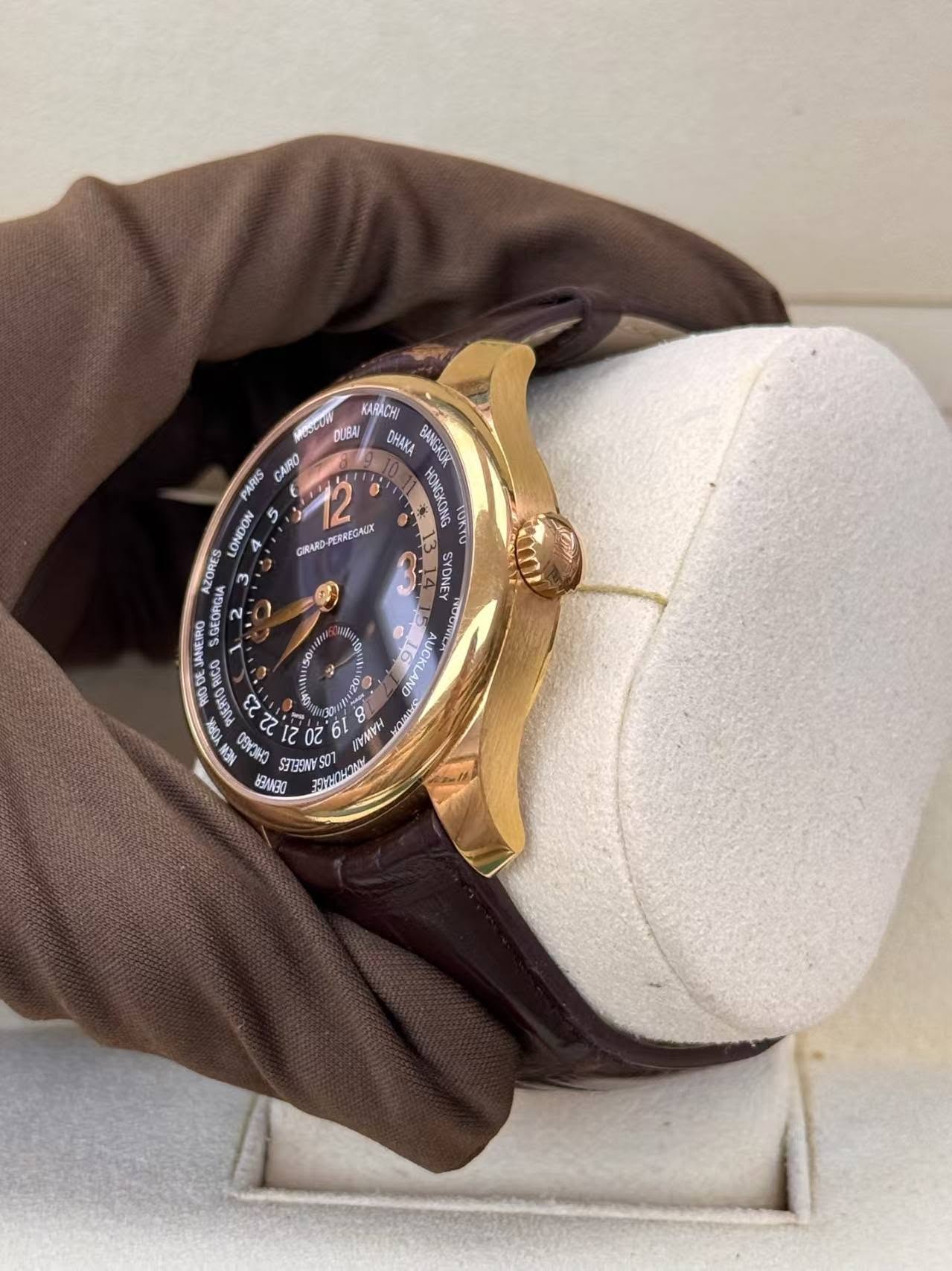 May be an image of wrist watch and text
