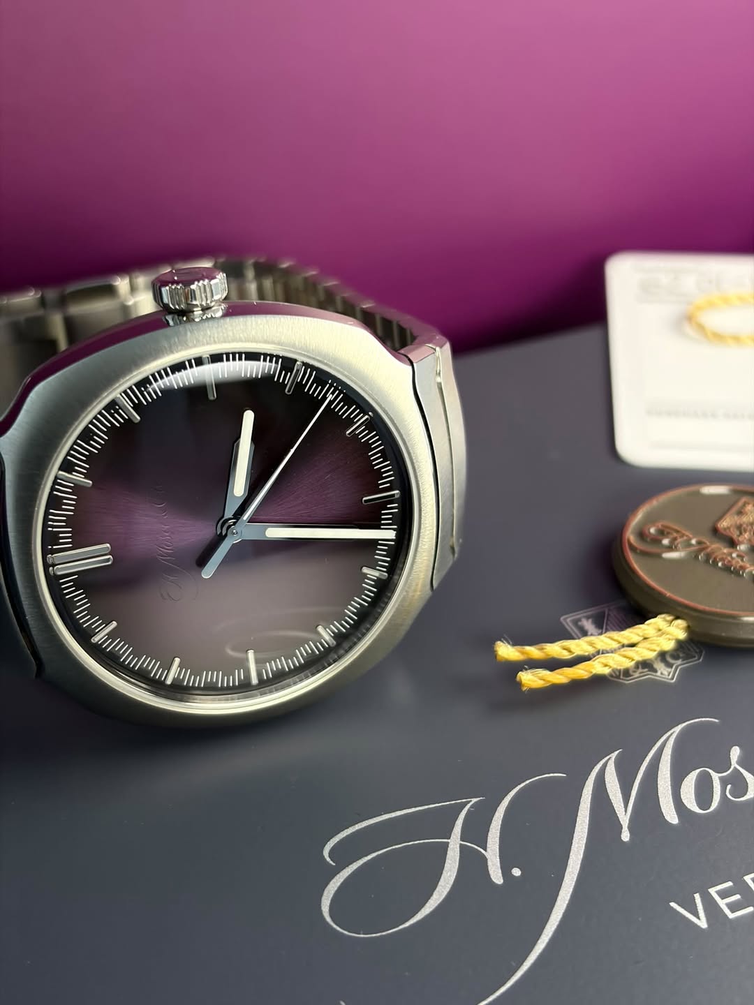 May be an image of wrist watch and text