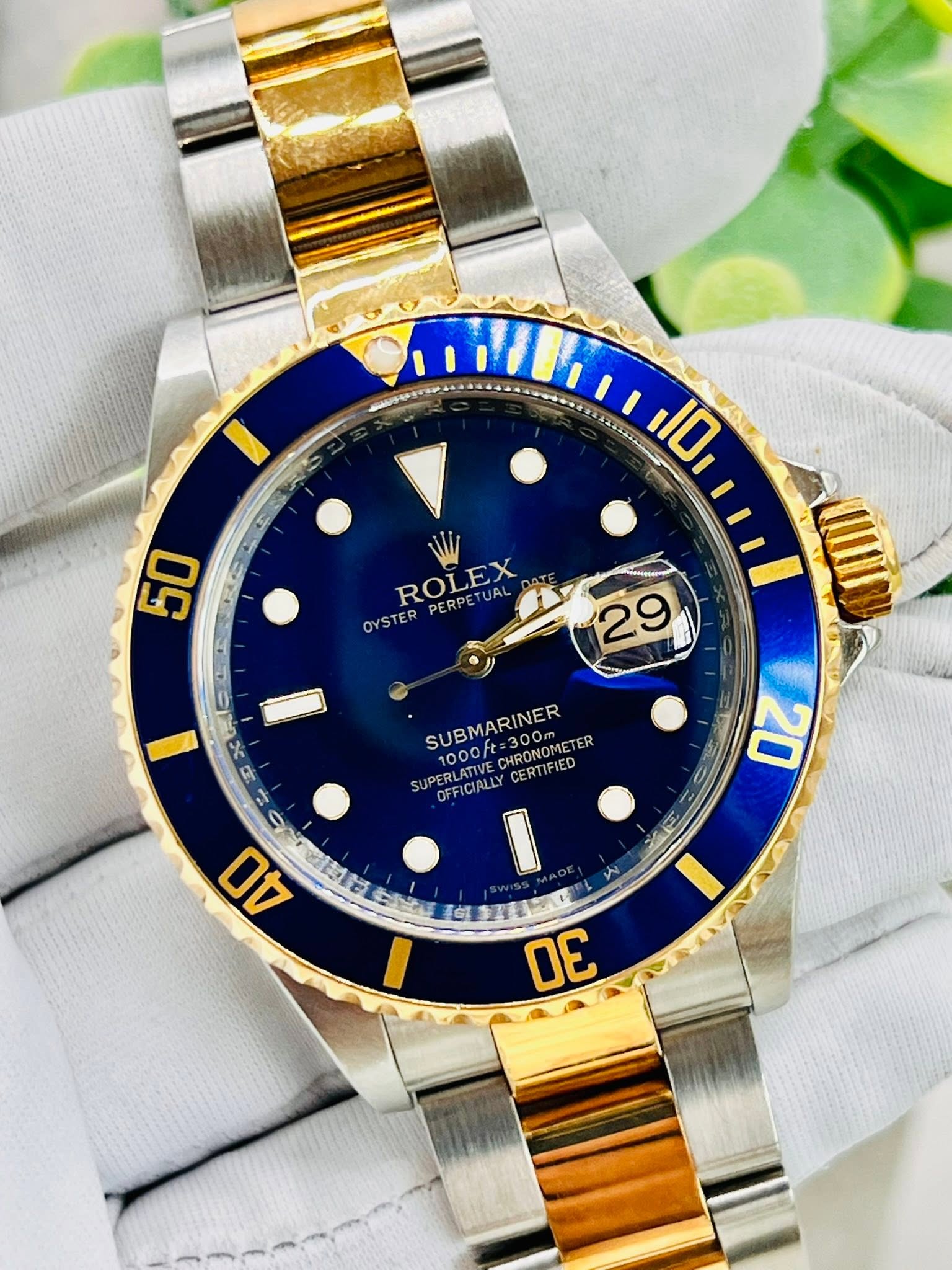 May be an image of wrist watch and text that says 'ΙΟι 50 ROLEX PERPETUAL OYSTER 29 אב P ₽ 2 = SUBMARINER SUPERLATIVECHRONOMETER PONOMETER TER oft:300m CHRONG HRONOMETE SUPERLA…