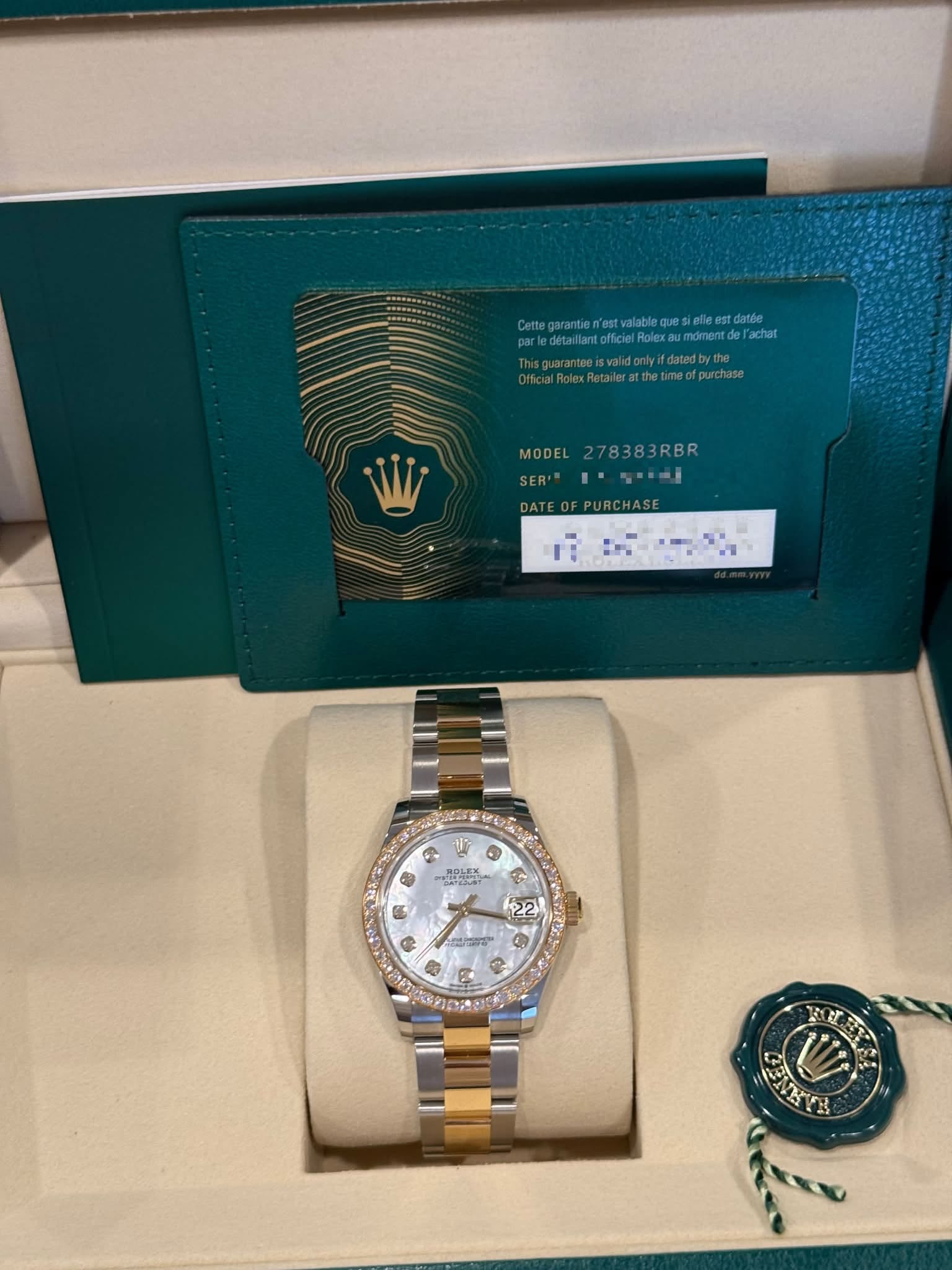 May be an image of wrist watch and text