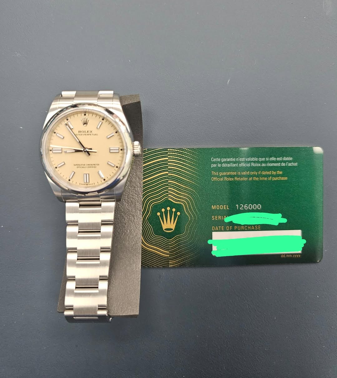 May be an image of wrist watch and text