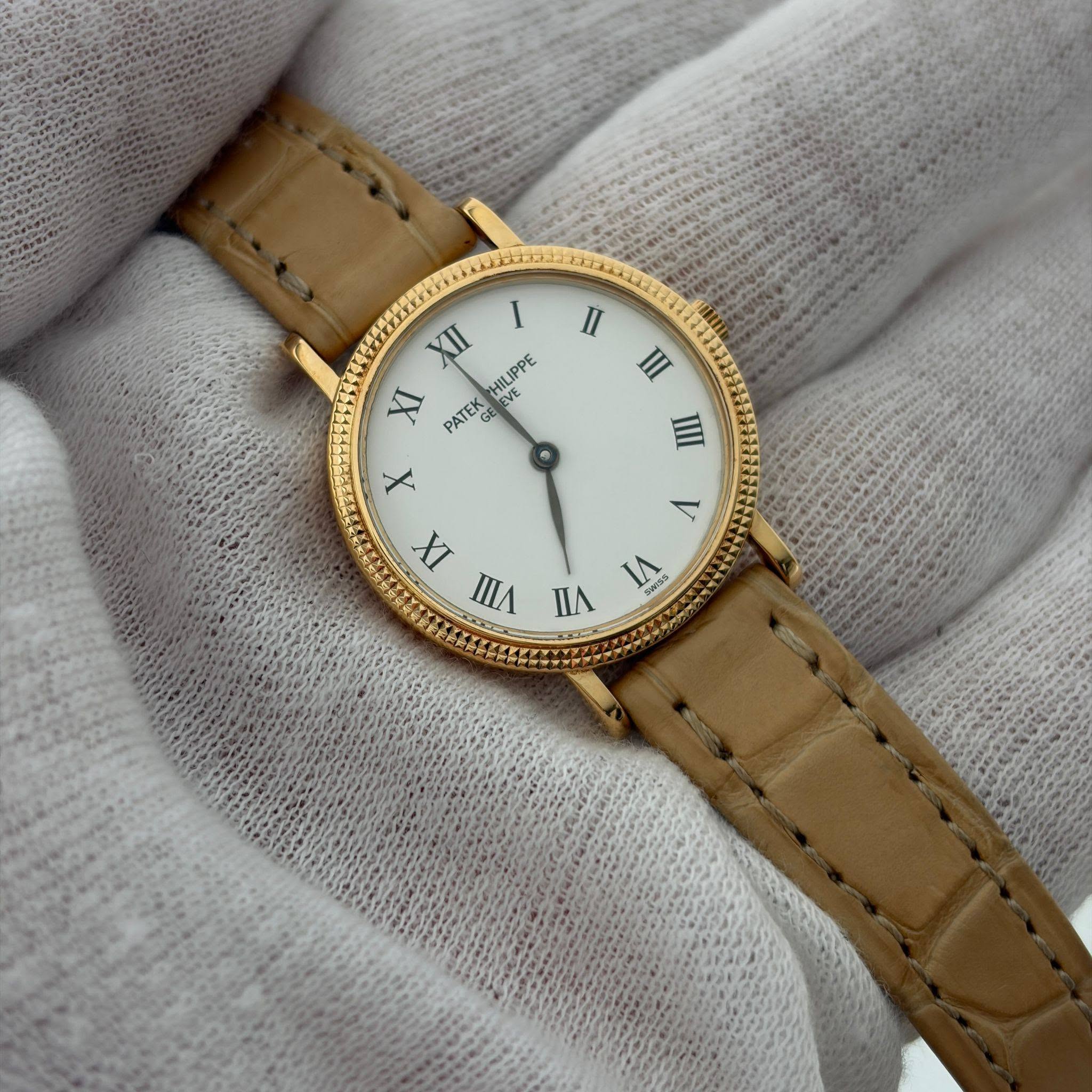 May be an image of wrist watch