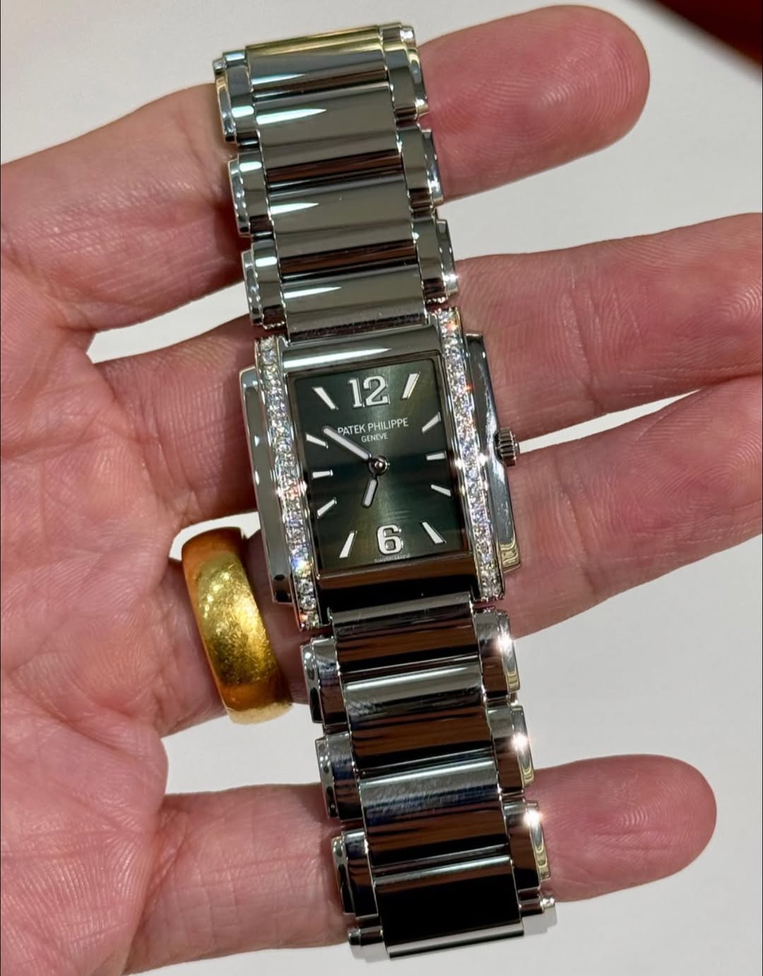 May be an image of digital watch and text
