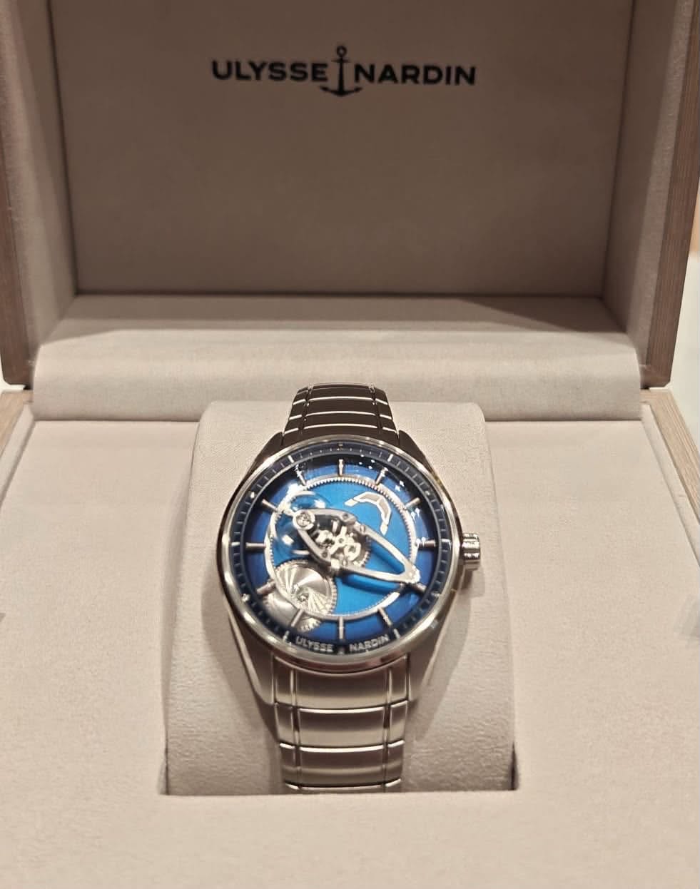 May be an image of wrist watch and text