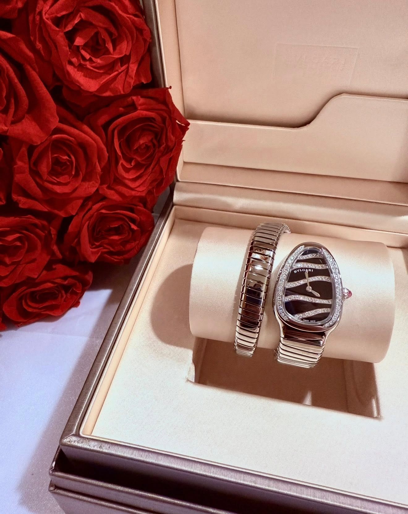 May be an image of wrist watch and ring