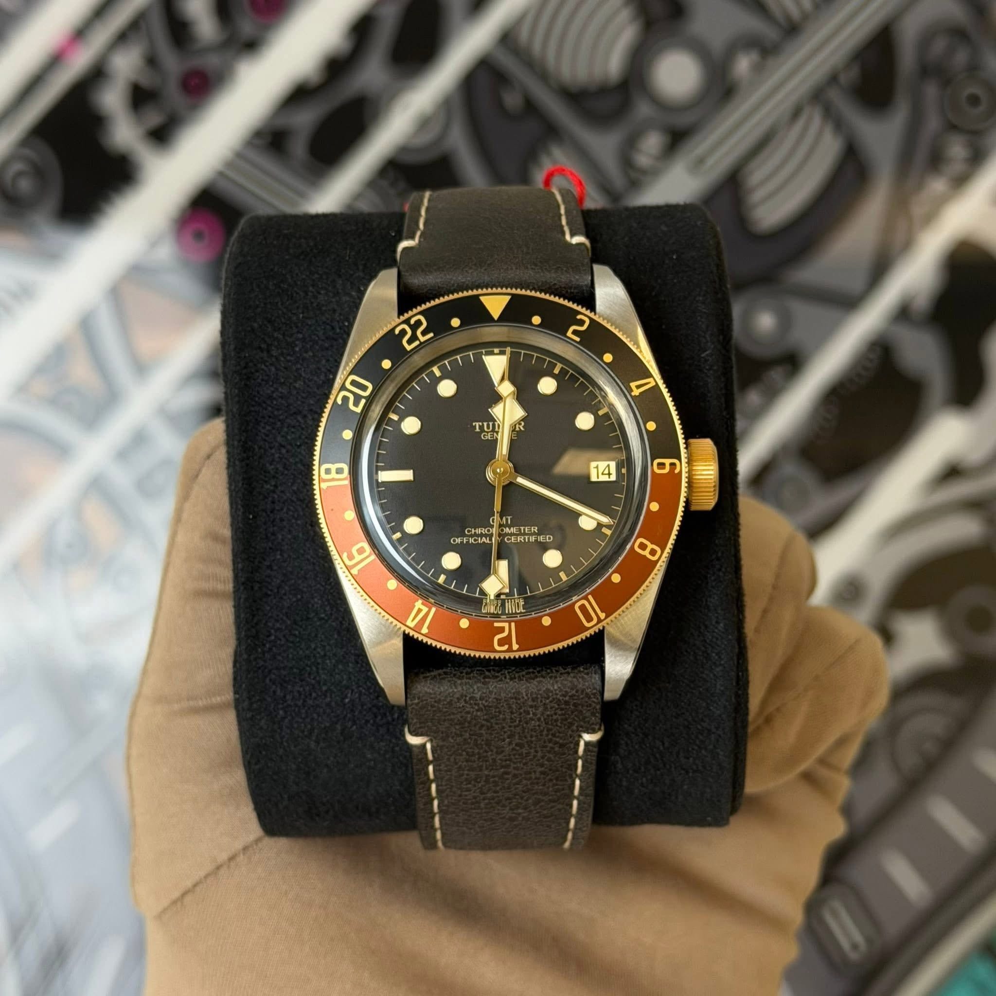 May be an image of wrist watch and text