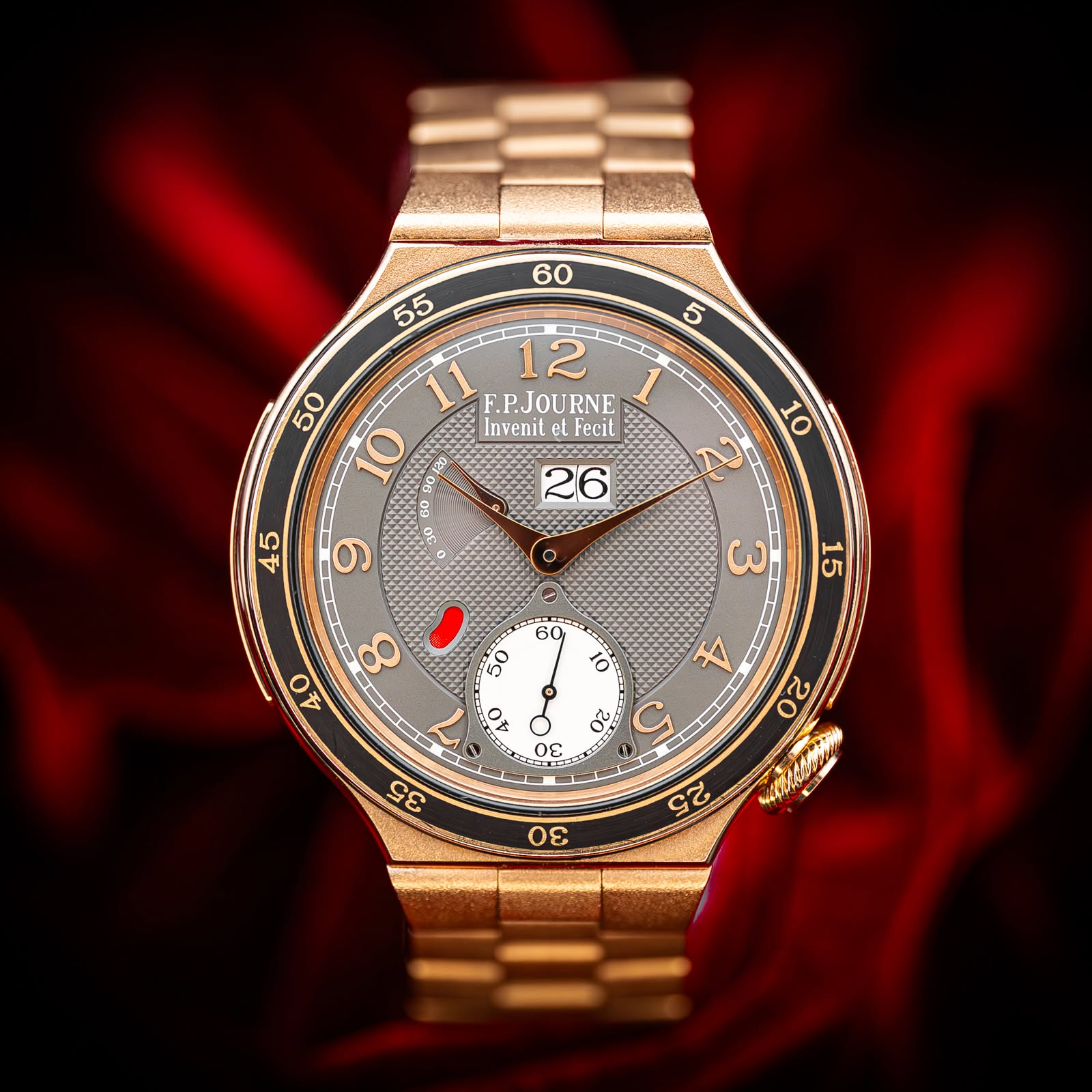 May be an image of wrist watch and text