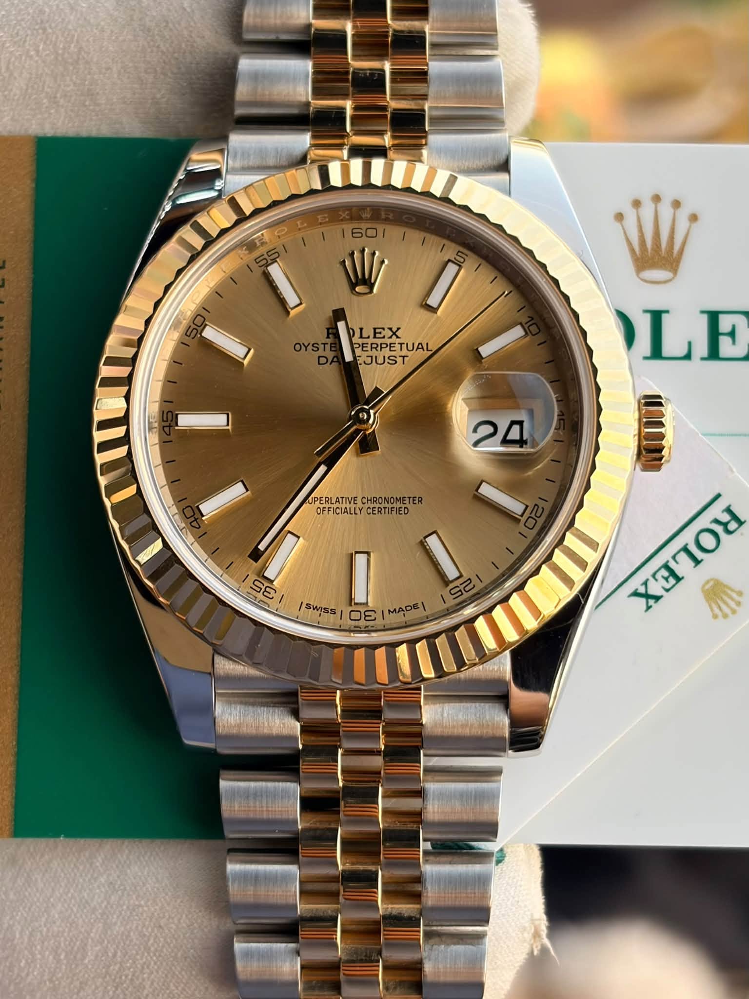 May be an image of wrist watch and text