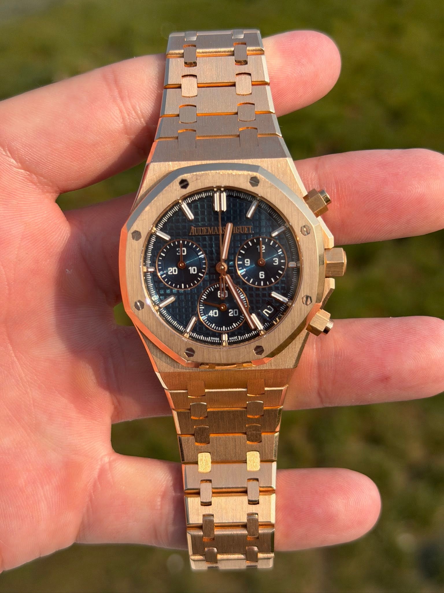 May be an image of wrist watch and text