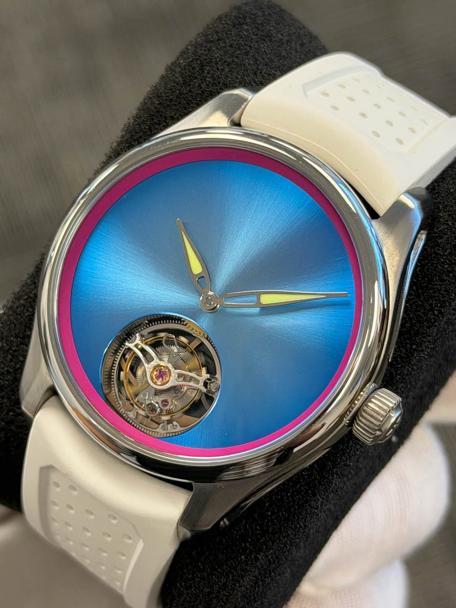 May be an image of wrist watch and text