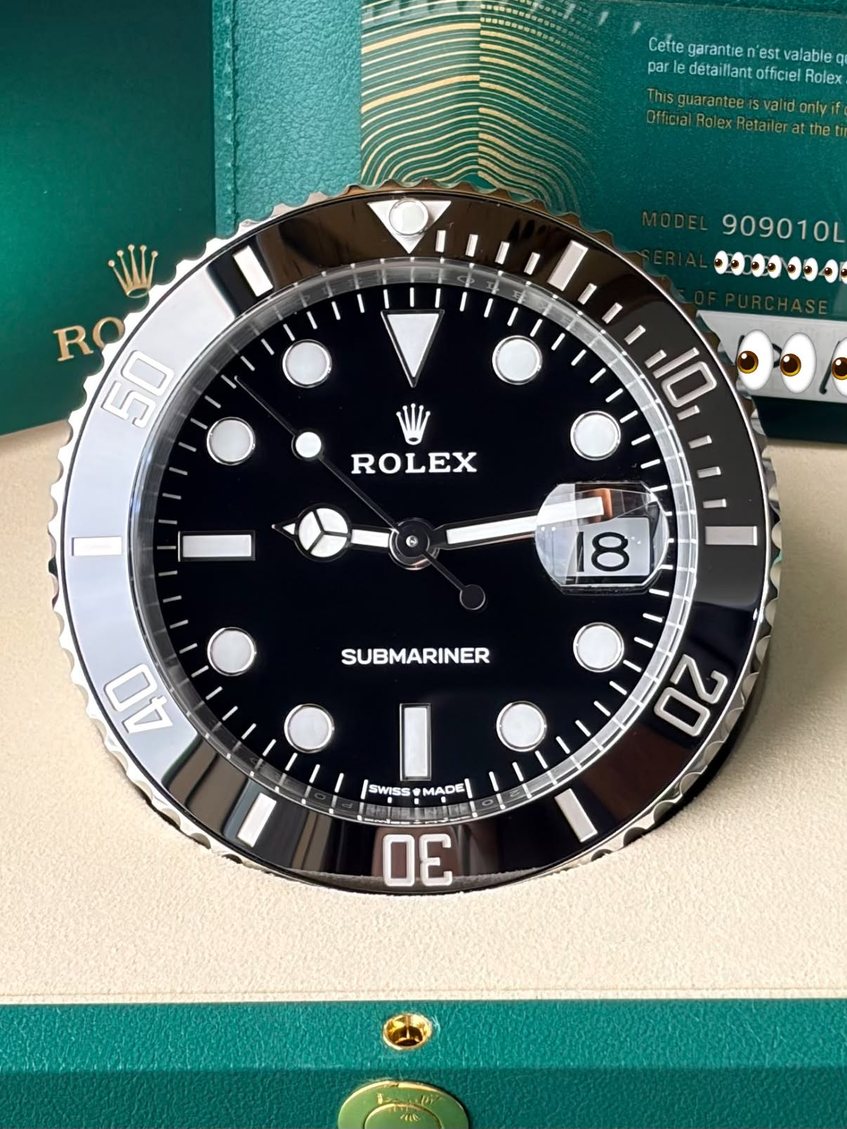 May be an image of wrist watch and text