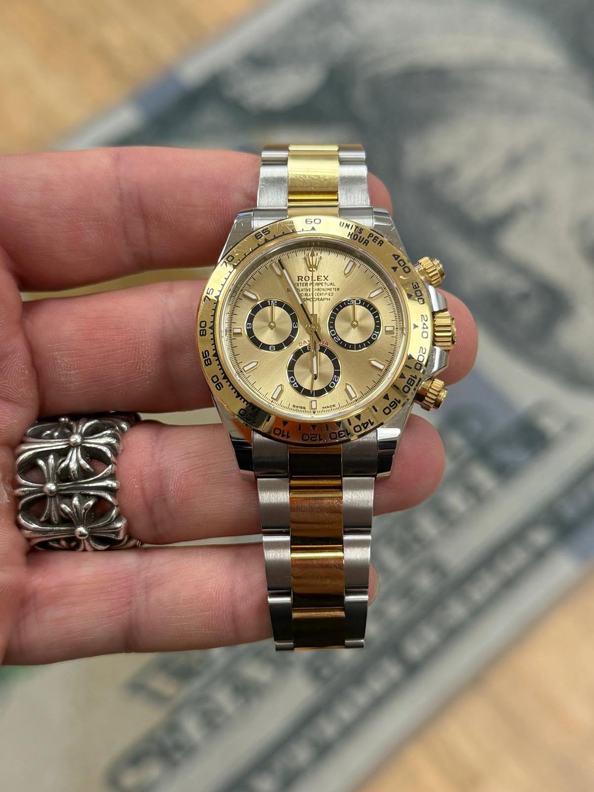 May be an image of wrist watch and text