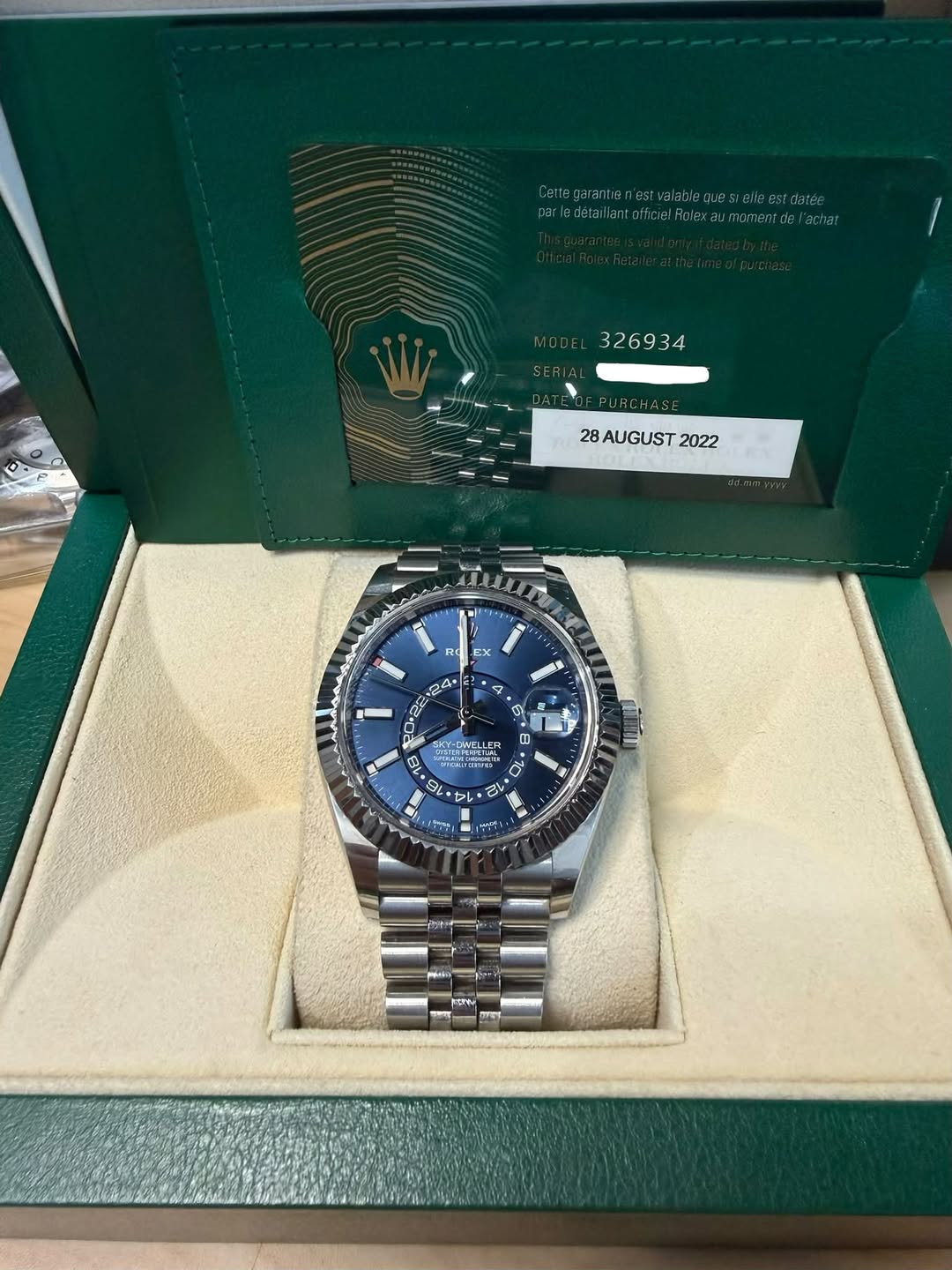 May be an image of wrist watch and text