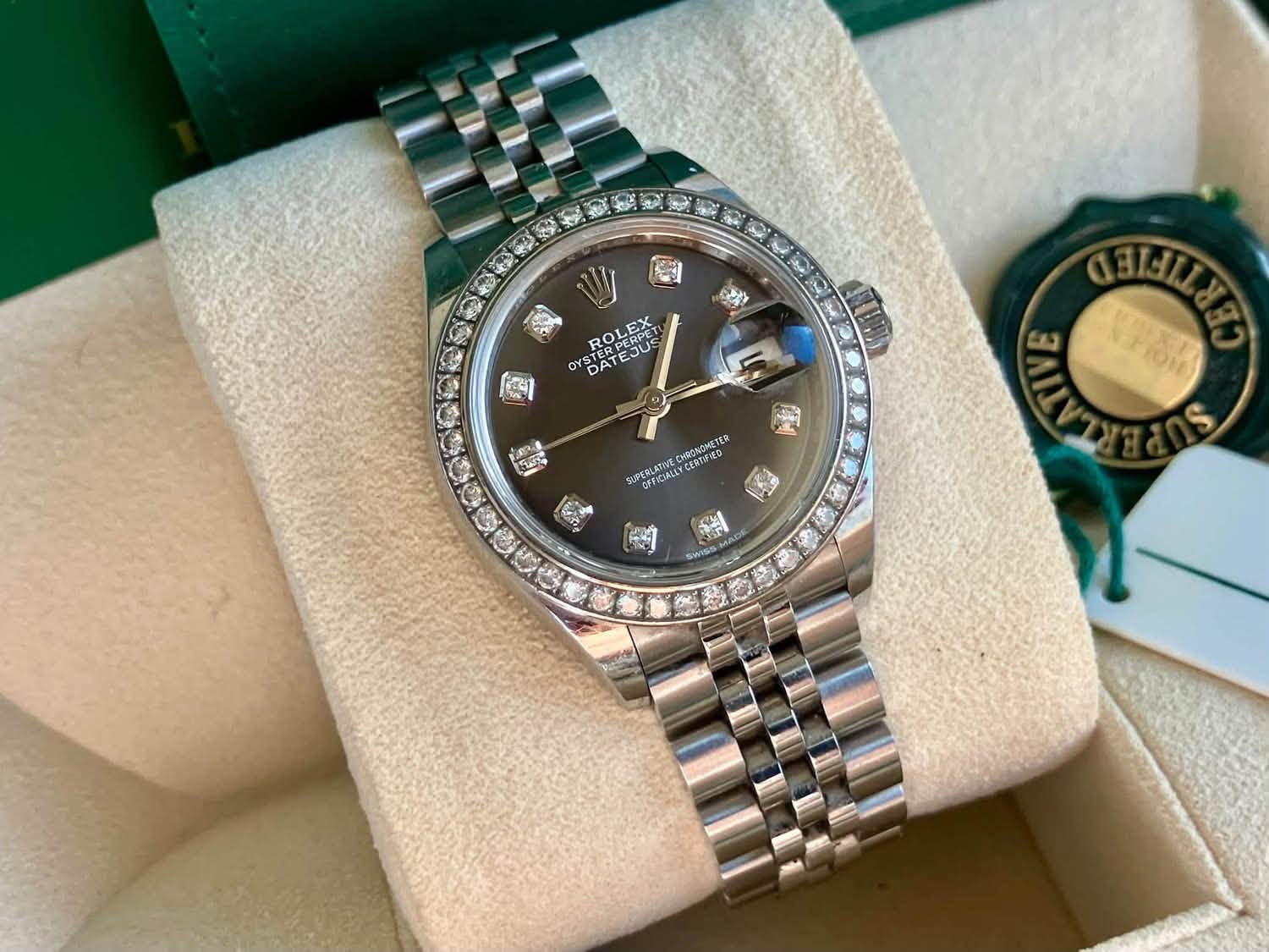 May be an image of wrist watch and text